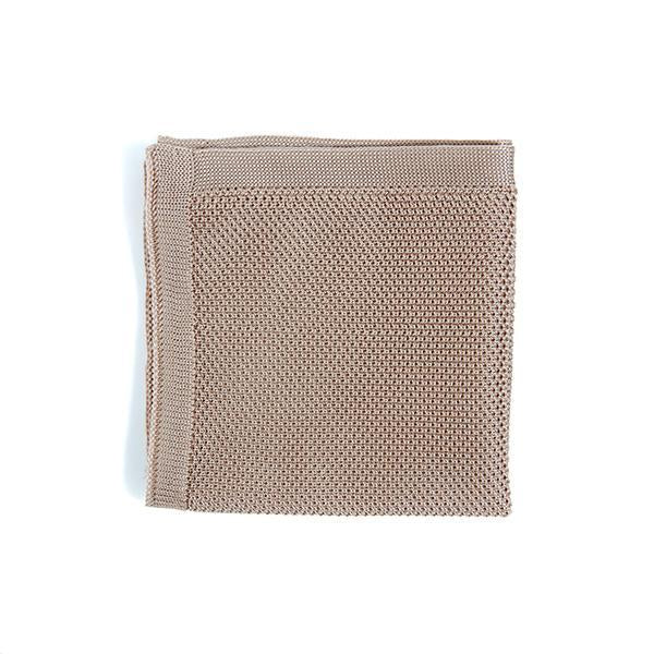 Champagne knitted pocket square displayed elegantly, showcasing its soft texture and refined color.