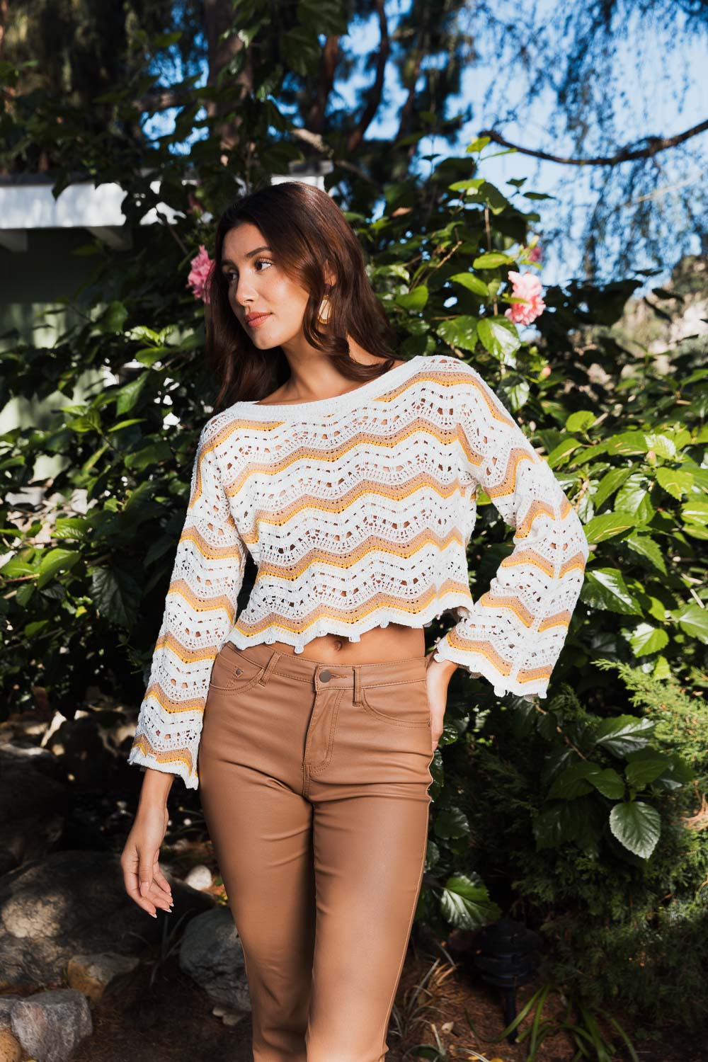 Chevron Chic Flare Crop Top featuring crochet design and flare sleeves, perfect for stylish outfits.
