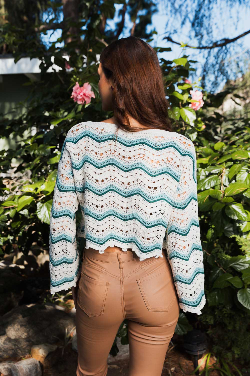 Chevron Chic Flare Crop Top featuring crochet design and flare sleeves, perfect for stylish outfits.