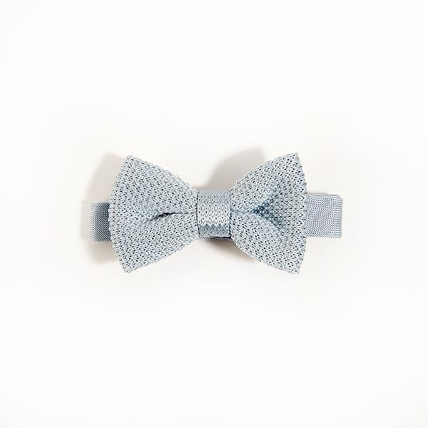 Children's misty blue knitted bow tie, featuring a stylish design and adjustable fit for ages 2 to 11.