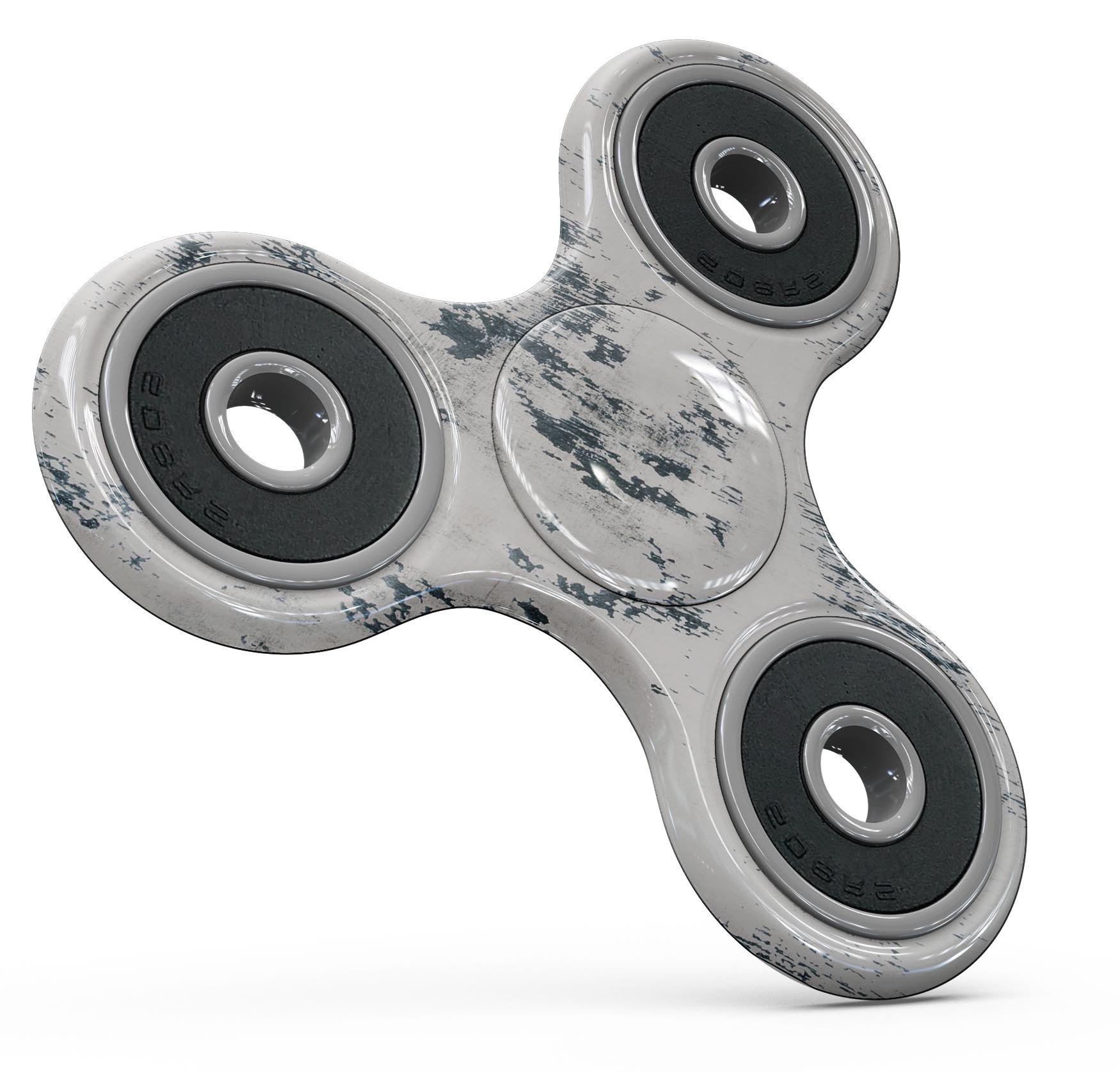 Chipped white painted surface fidget spinner skin kit showcasing a unique design and premium vinyl material.