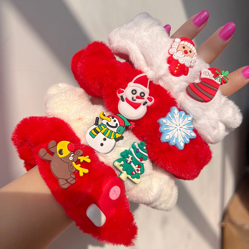 A cute Christmas Snowman Plush Hair Tie featuring a soft snowman design, perfect for festive hairstyles.