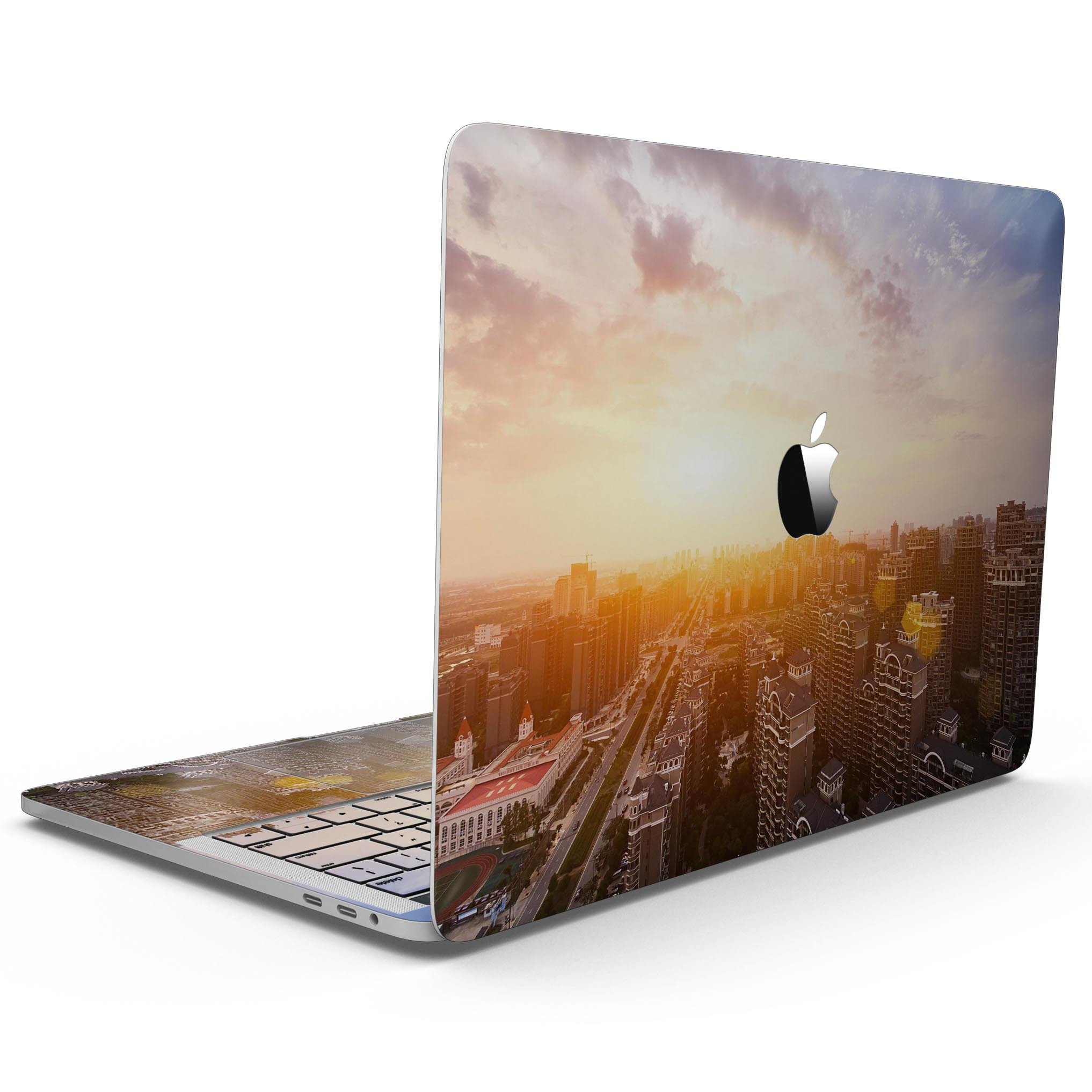 Cityscape at Sunset MacBook Pro skin kit showcasing vibrant colors and sleek design, perfect for personalizing your device.