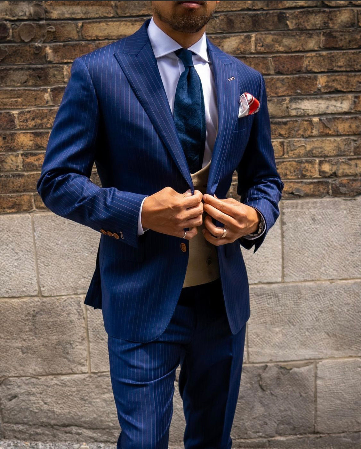 Classic London Pocket Square featuring hand-sketched London landmarks in blue and red silk.