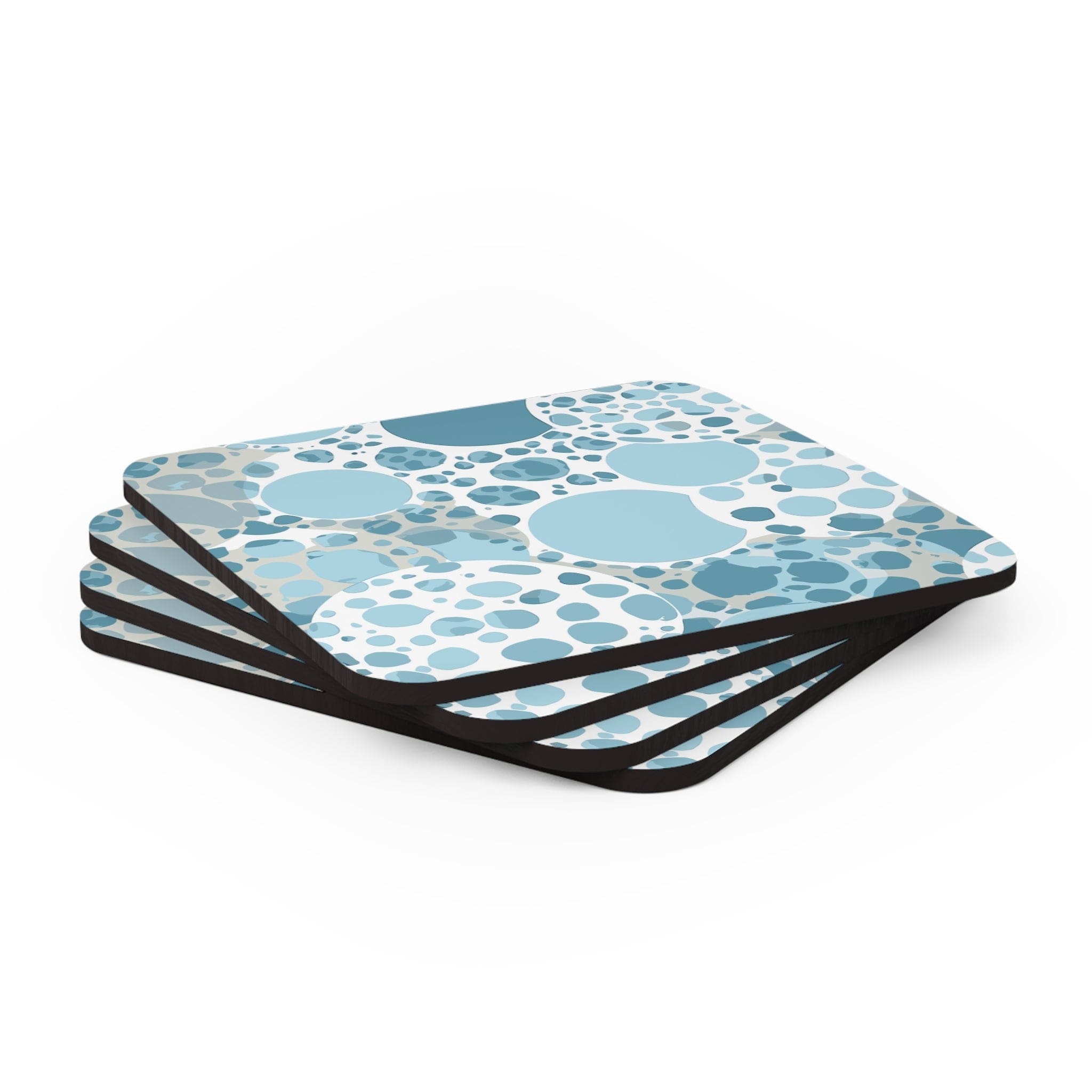 A stylish set of 4 blue and white circular spotted coasters, perfect for drinks, showcasing their unique design and quality craftsmanship.