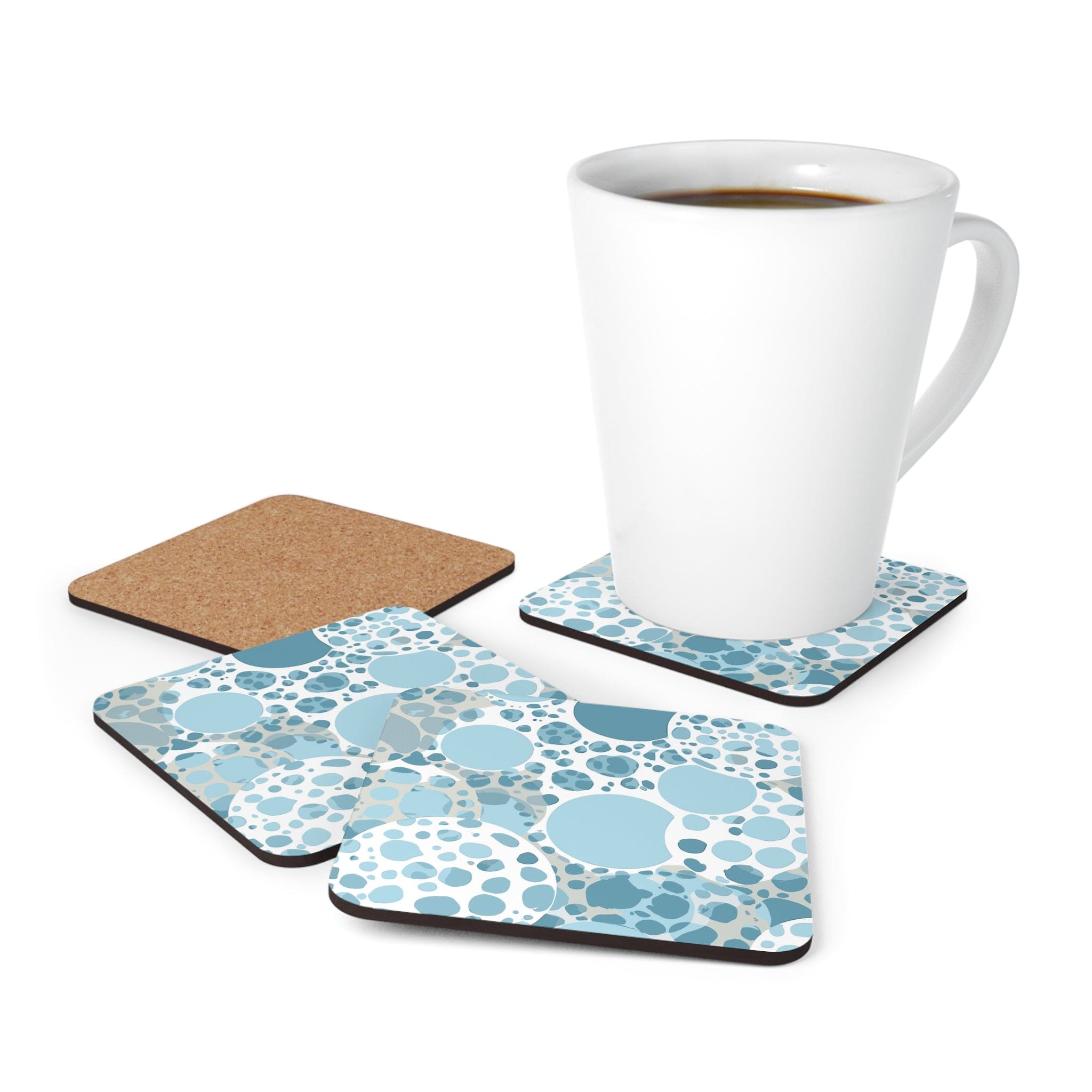 A stylish set of 4 blue and white circular spotted coasters, perfect for drinks, showcasing their unique design and quality craftsmanship.