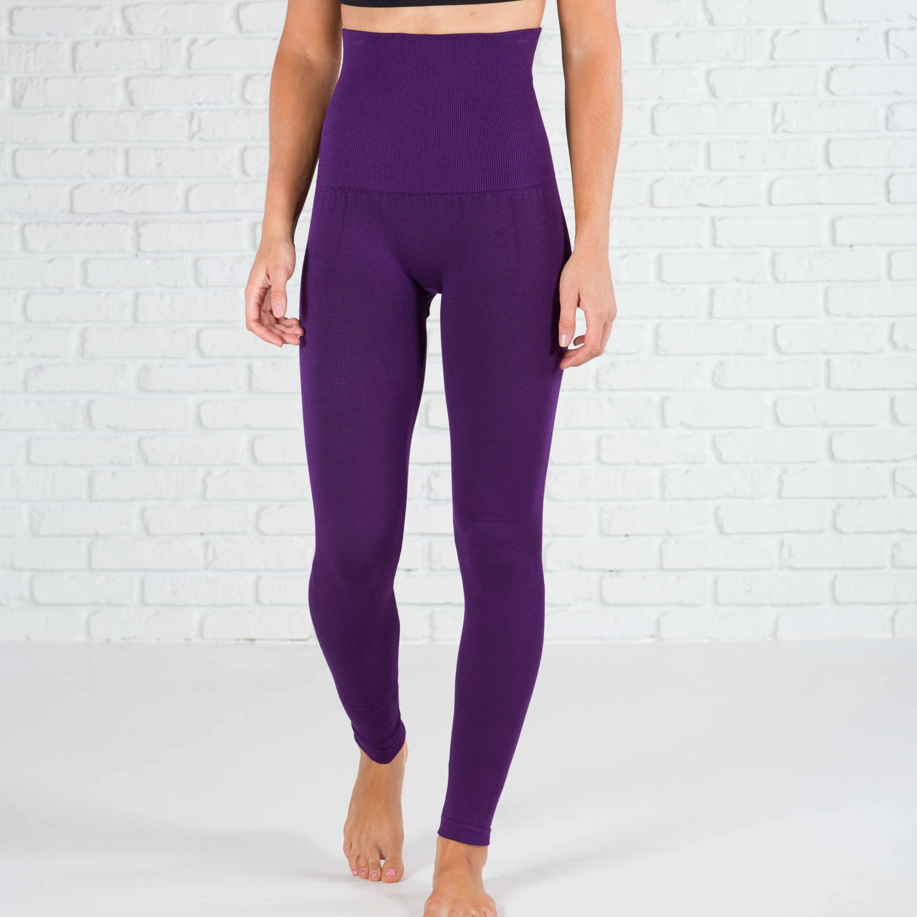 Compression Tummy Control Leggings with fleece lining, showcasing the extra tall waistband and thick compression material.