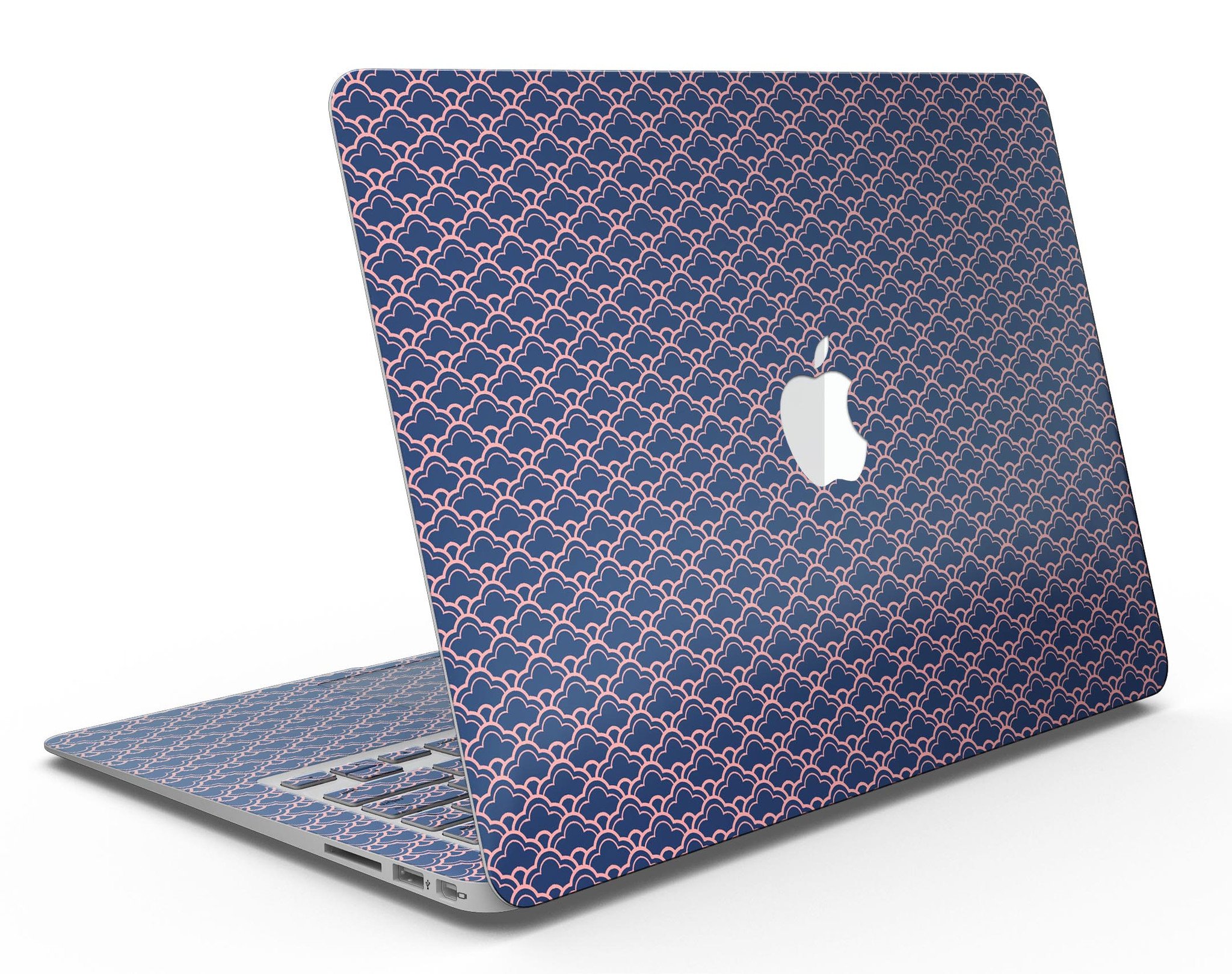 Coral and Navy Micro Cloud Pattern skin applied to a MacBook Air, showcasing its vibrant design and sleek fit.