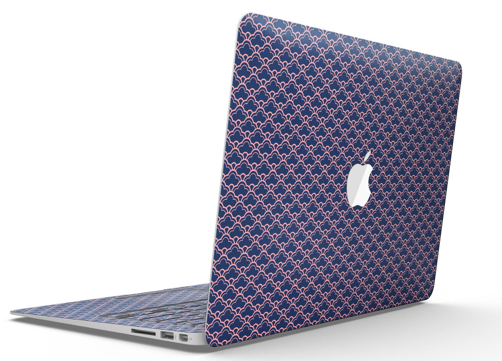 Coral and Navy Micro Cloud Pattern skin applied to a MacBook Air, showcasing its vibrant design and sleek fit.