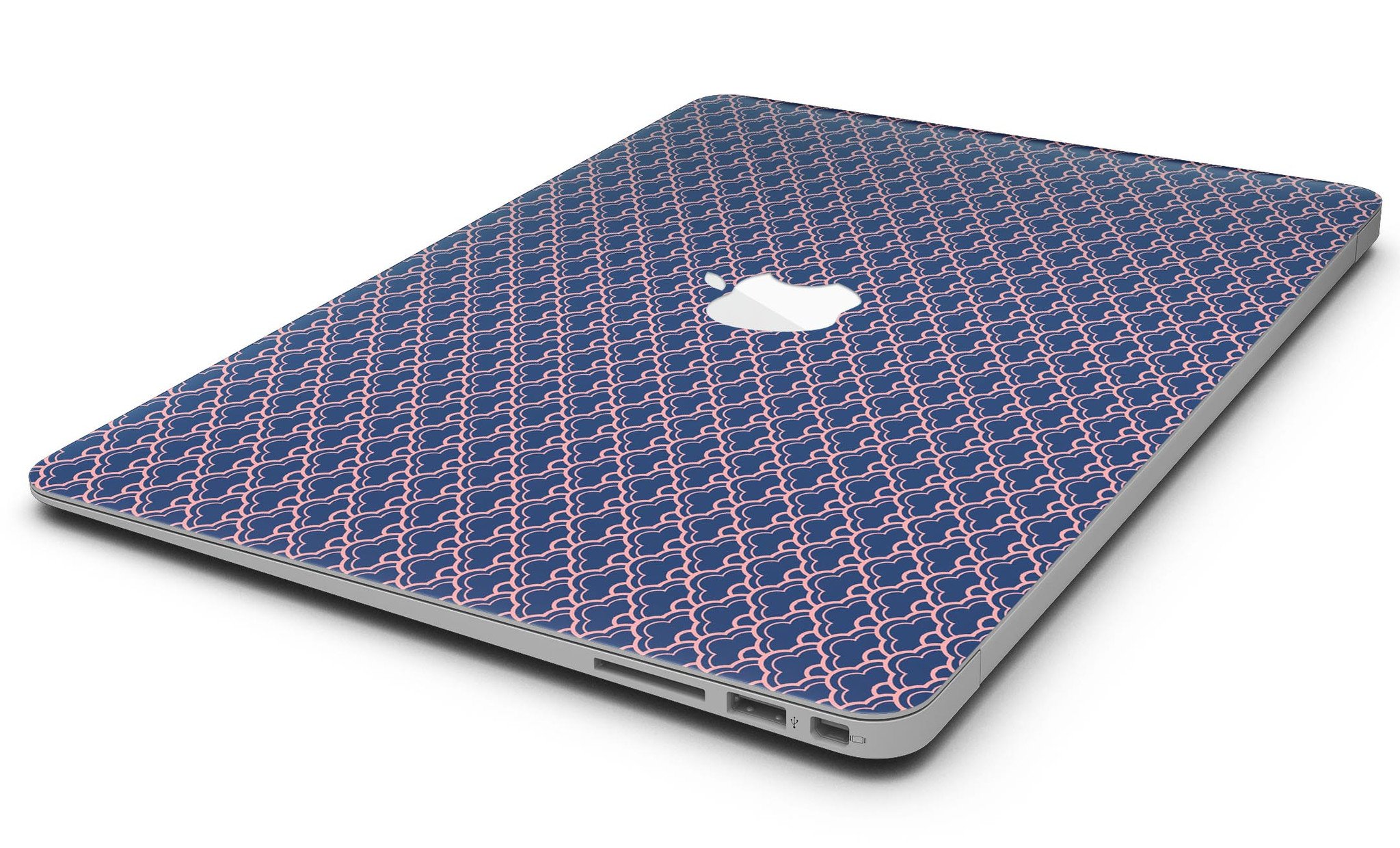 Coral and Navy Micro Cloud Pattern skin applied to a MacBook Air, showcasing its vibrant design and sleek fit.