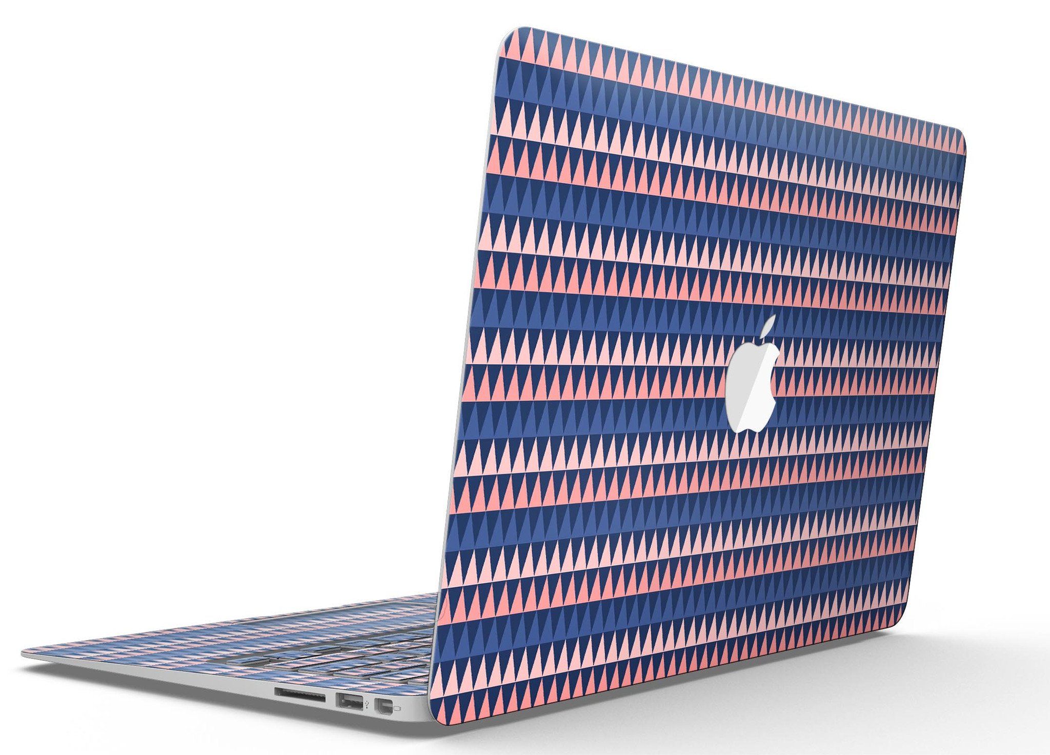 Coral and Navy Micro Triangles skin kit for MacBook Air, showcasing a vibrant geometric design on a sleek device.