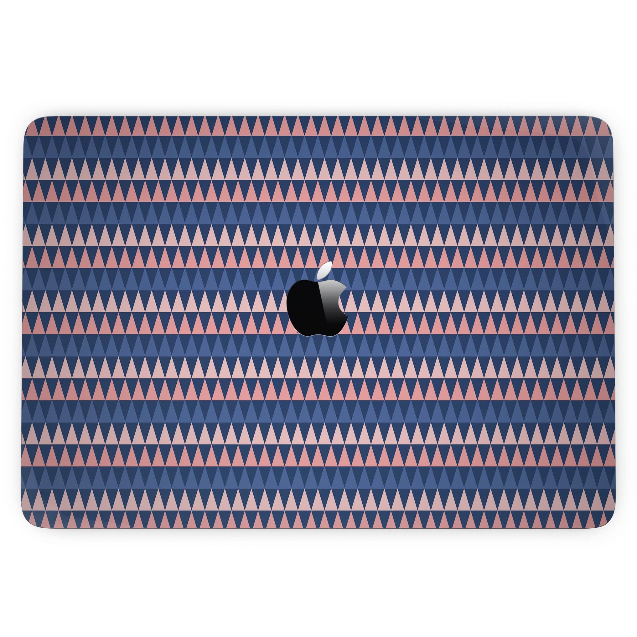 Coral and Navy Micro Triangles skin kit for MacBook Pro with Touch Bar, showcasing vibrant geometric patterns on a sleek device.