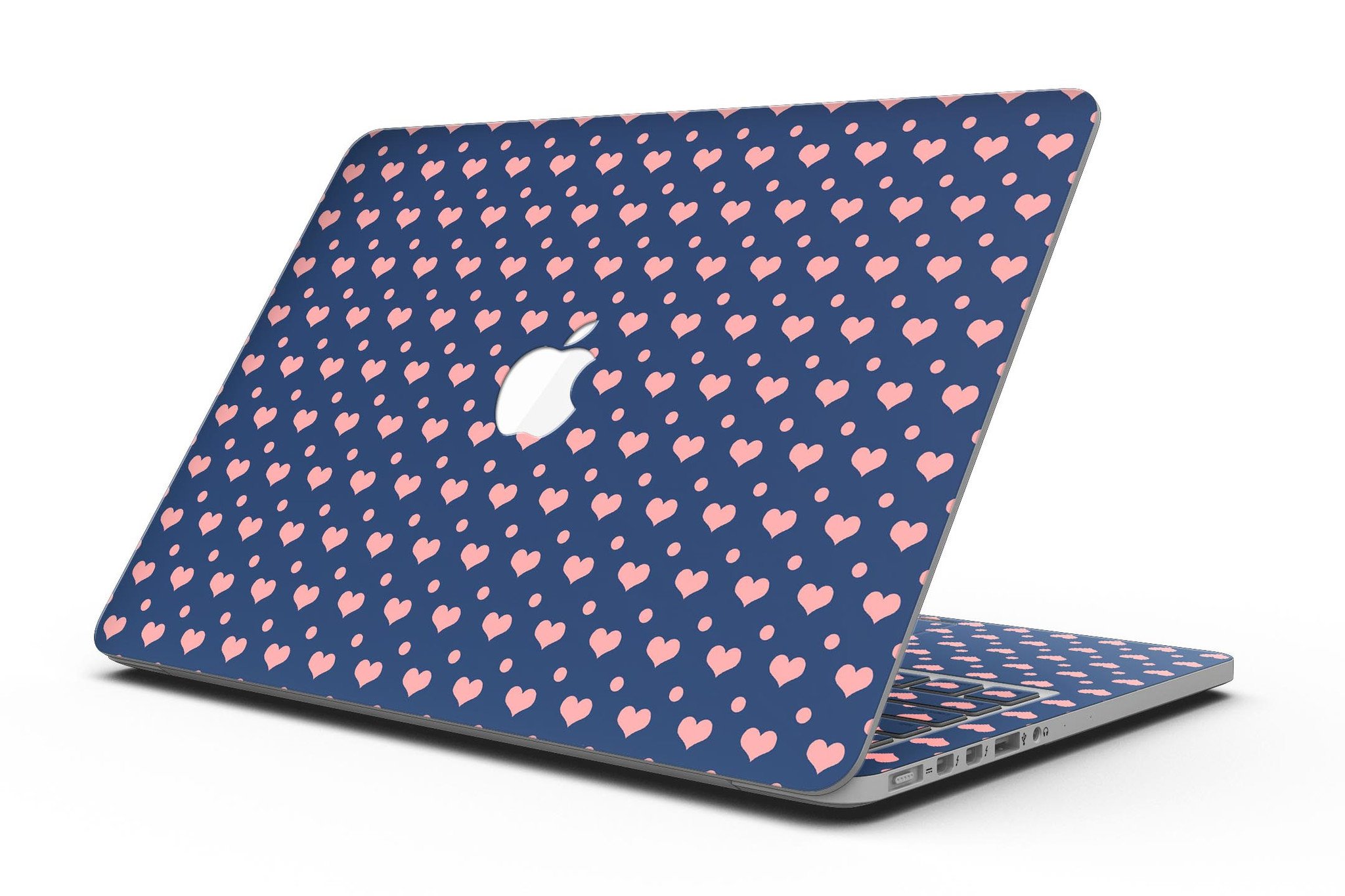 Coral Micro Hearts and Dots skin for MacBook Pro with Retina Display, showcasing a vibrant design on a sleek laptop.