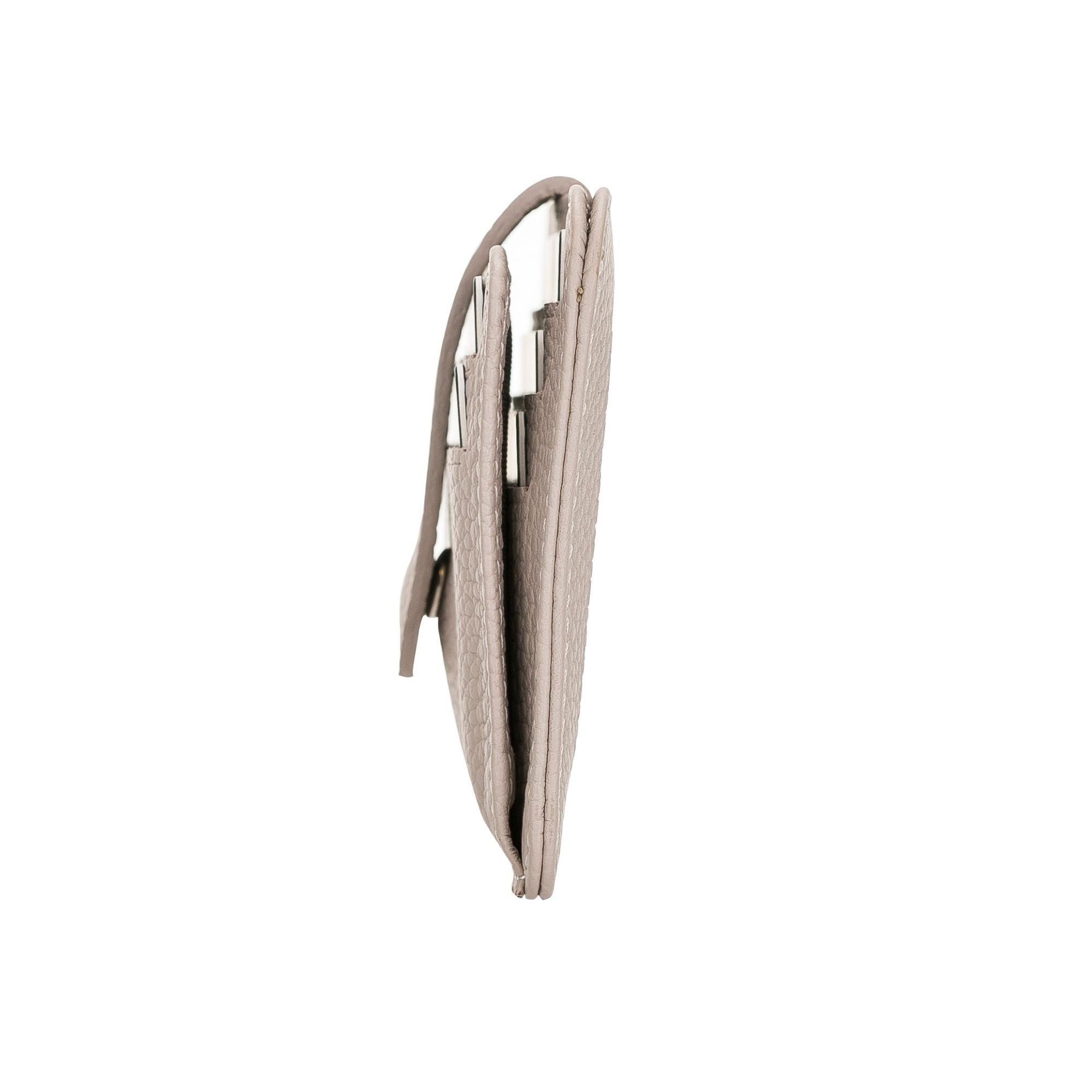 Cortez Handcrafted Leather Slim Wallet showcasing its elegant design and multiple card slots.