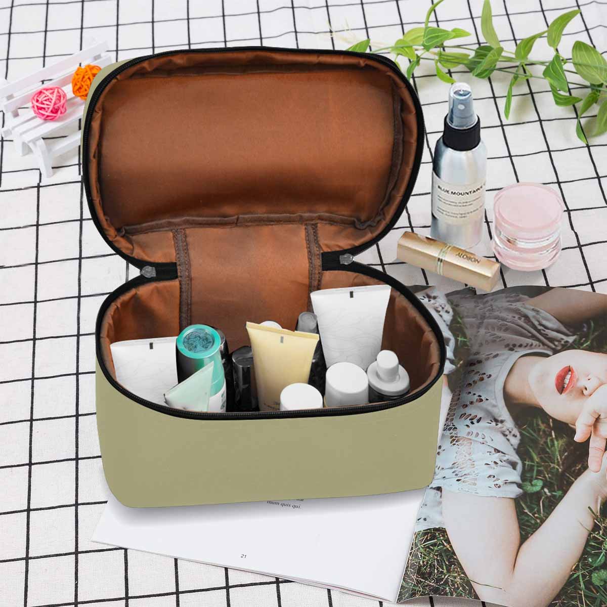 Sage Green Cosmetic Bag with multiple compartments and secure zipper closure, perfect for organizing beauty essentials.