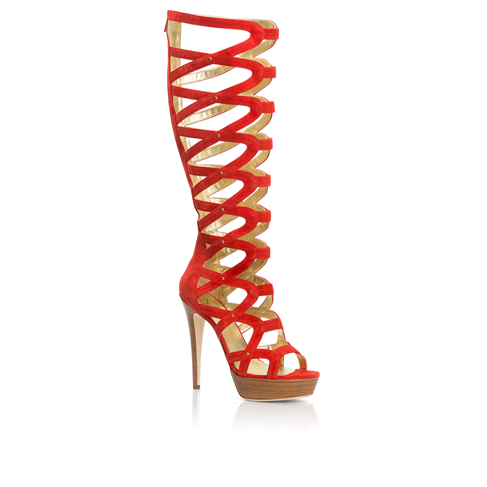 Courage stiletto featuring crimson suede, stud details, and a gold zipper, set on a wood veneer platform.