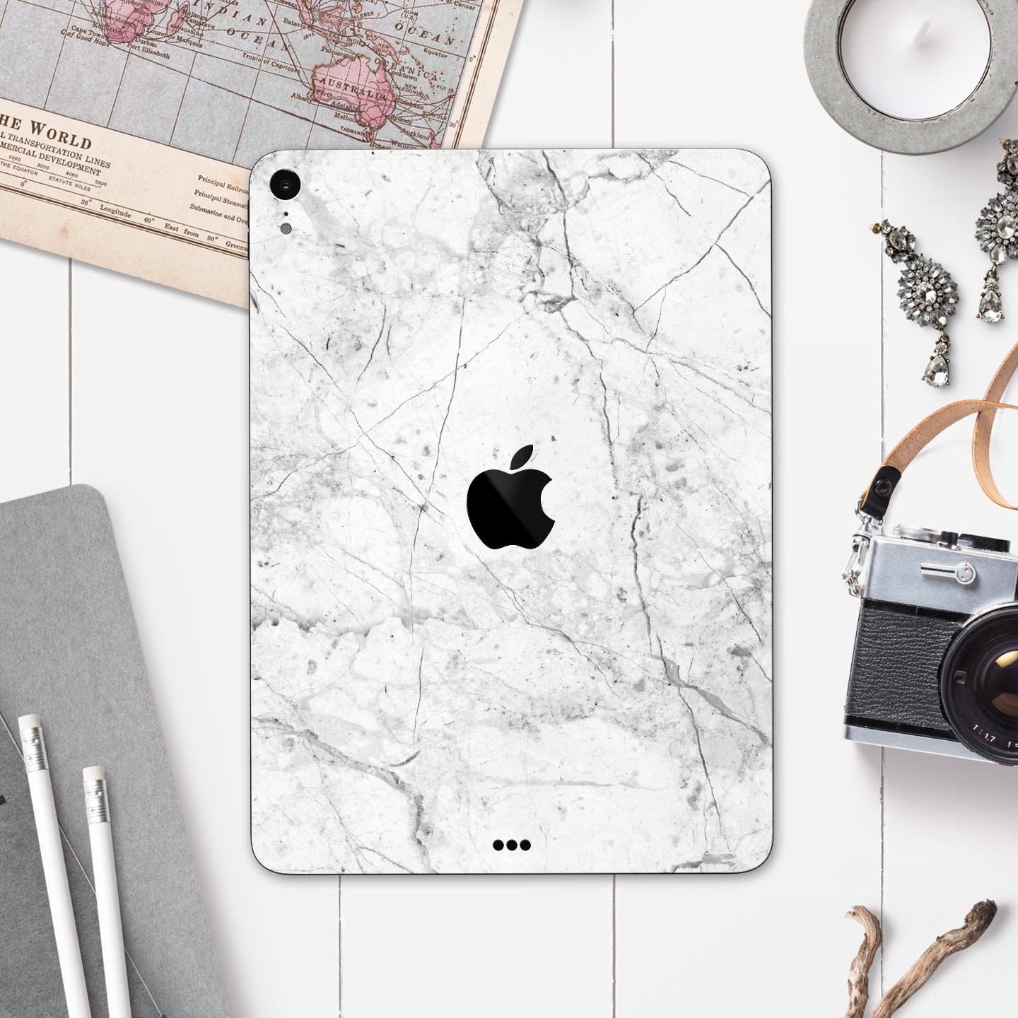Cracked Marble Surface Full Body Skin Decal for Apple iPad Pro, showcasing a stylish design with premium finish.
