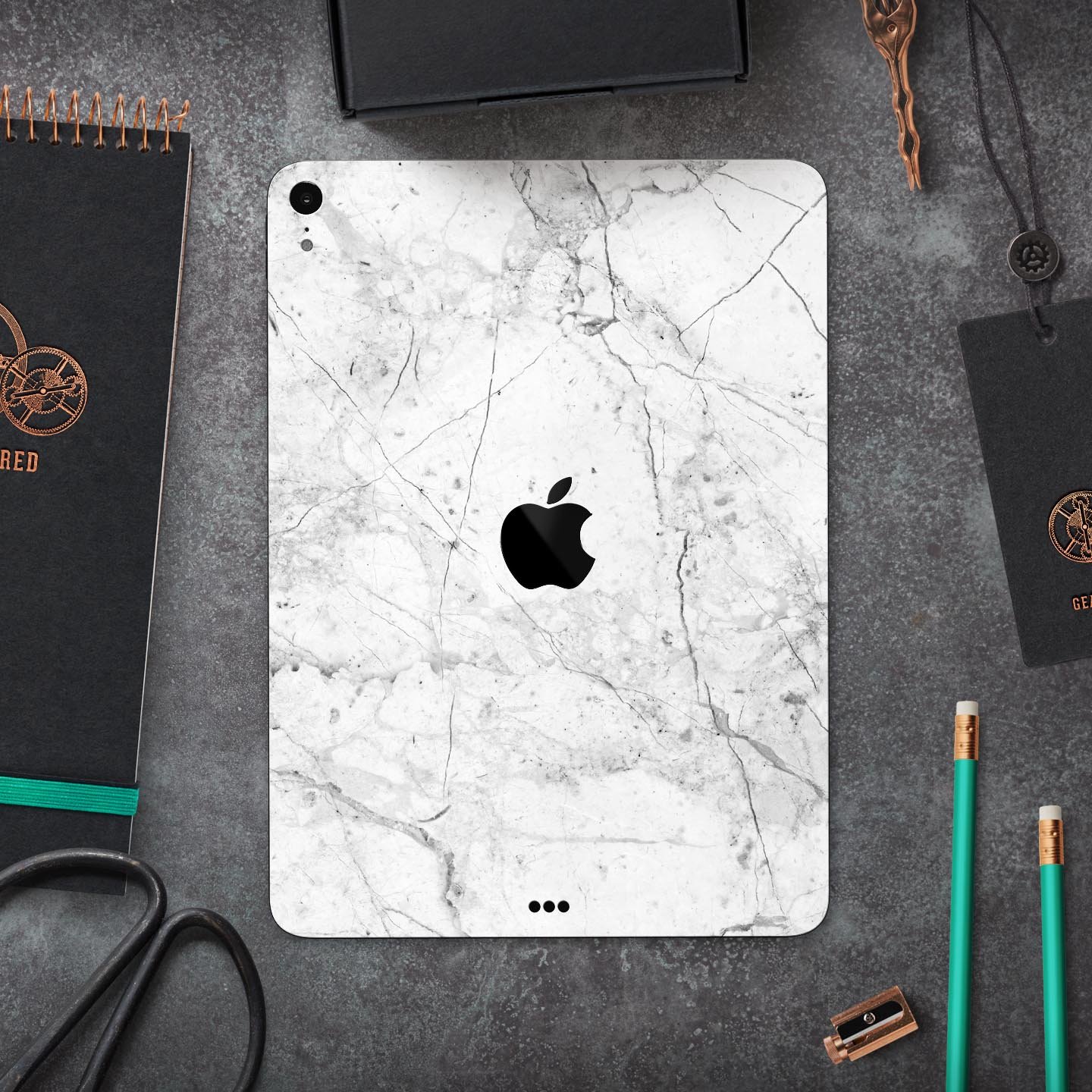 Cracked Marble Surface Full Body Skin Decal for Apple iPad Pro, showcasing a stylish design with premium finish.