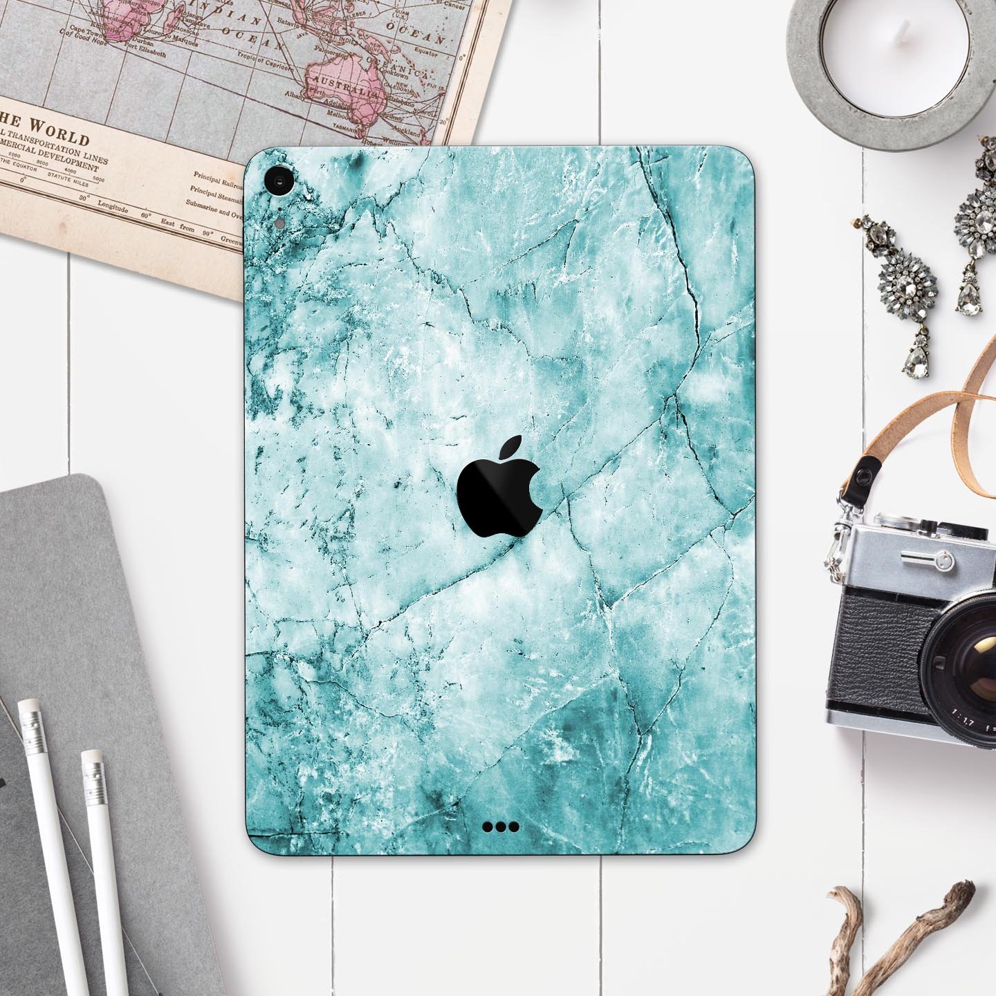 Cracked Turquoise Marble Surface Skin Decal for Apple devices, showcasing a vibrant marble design with a smooth finish.
