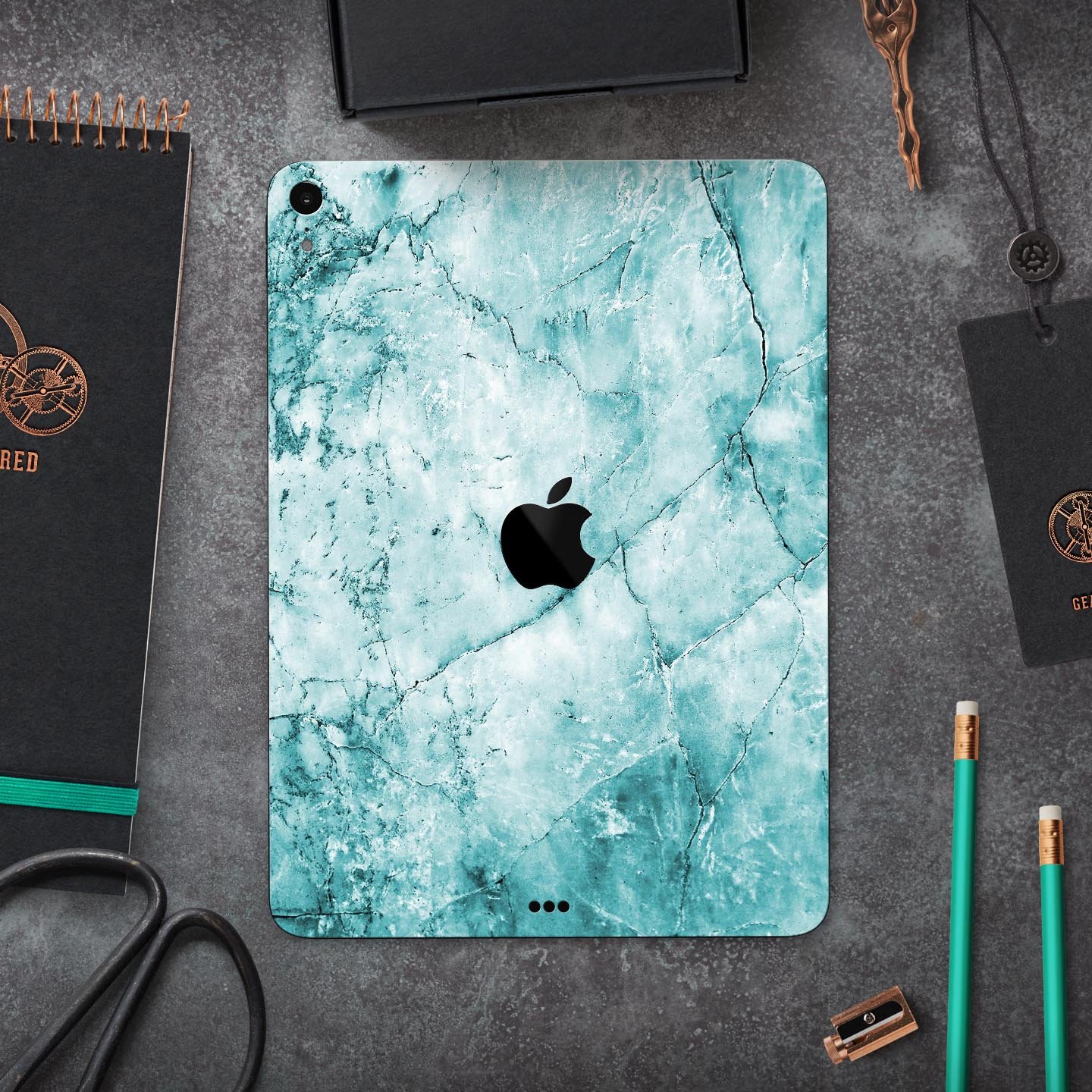 Cracked Turquoise Marble Surface Skin Decal for Apple devices, showcasing a vibrant marble design with a smooth finish.