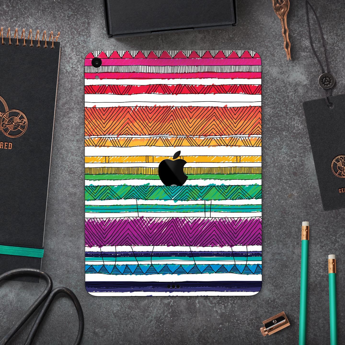 Colorful crayon doodle patterns skin decal for Apple devices, showcasing vibrant designs and premium quality materials.