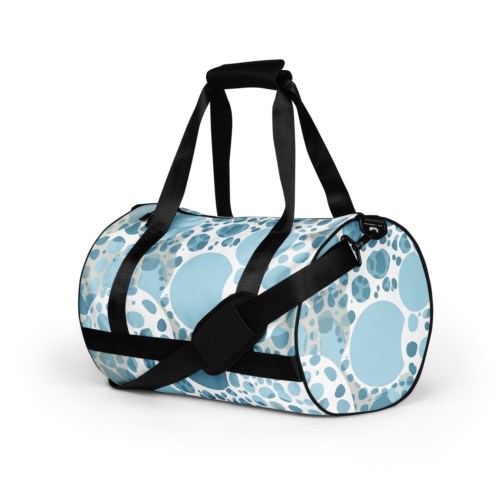 Crossbody water-resistant travel bag featuring a blue and white circular spotted design, ideal for fitness and travel.