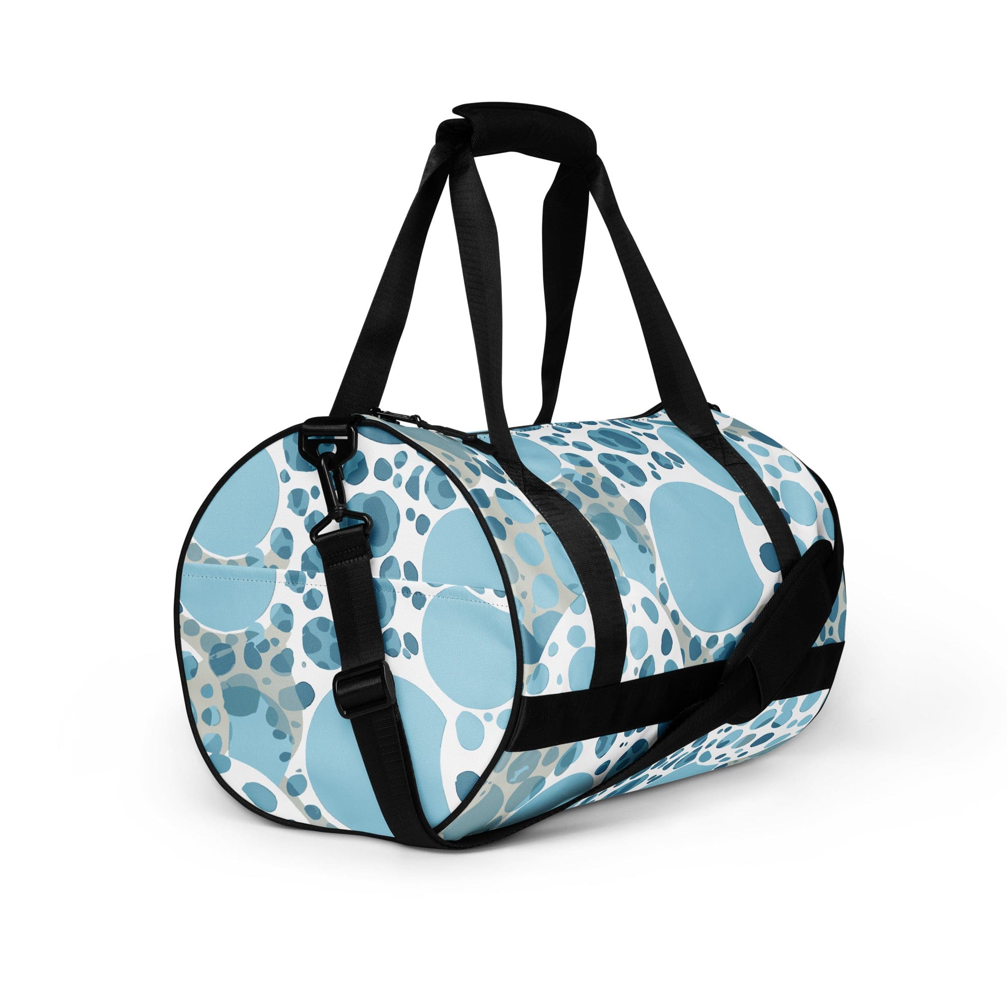 Crossbody water-resistant travel bag featuring a blue and white circular spotted design, ideal for fitness and travel.