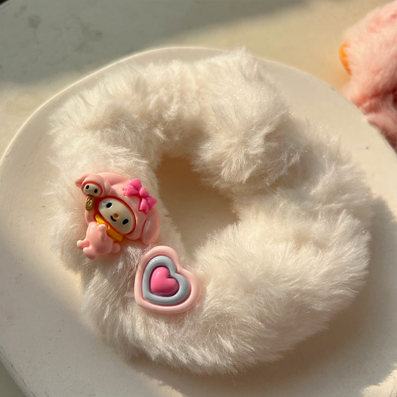 Cute Princess Pink Plush Hair Tie featuring a soft plush material and a charming crown design in pink.