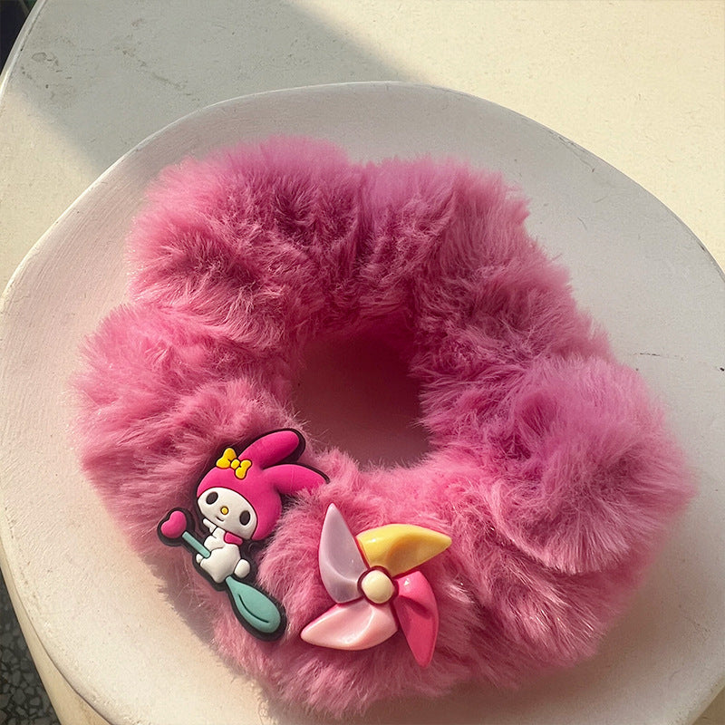 Cute Princess Pink Plush Hair Tie featuring a soft plush material and a charming crown design in pink.