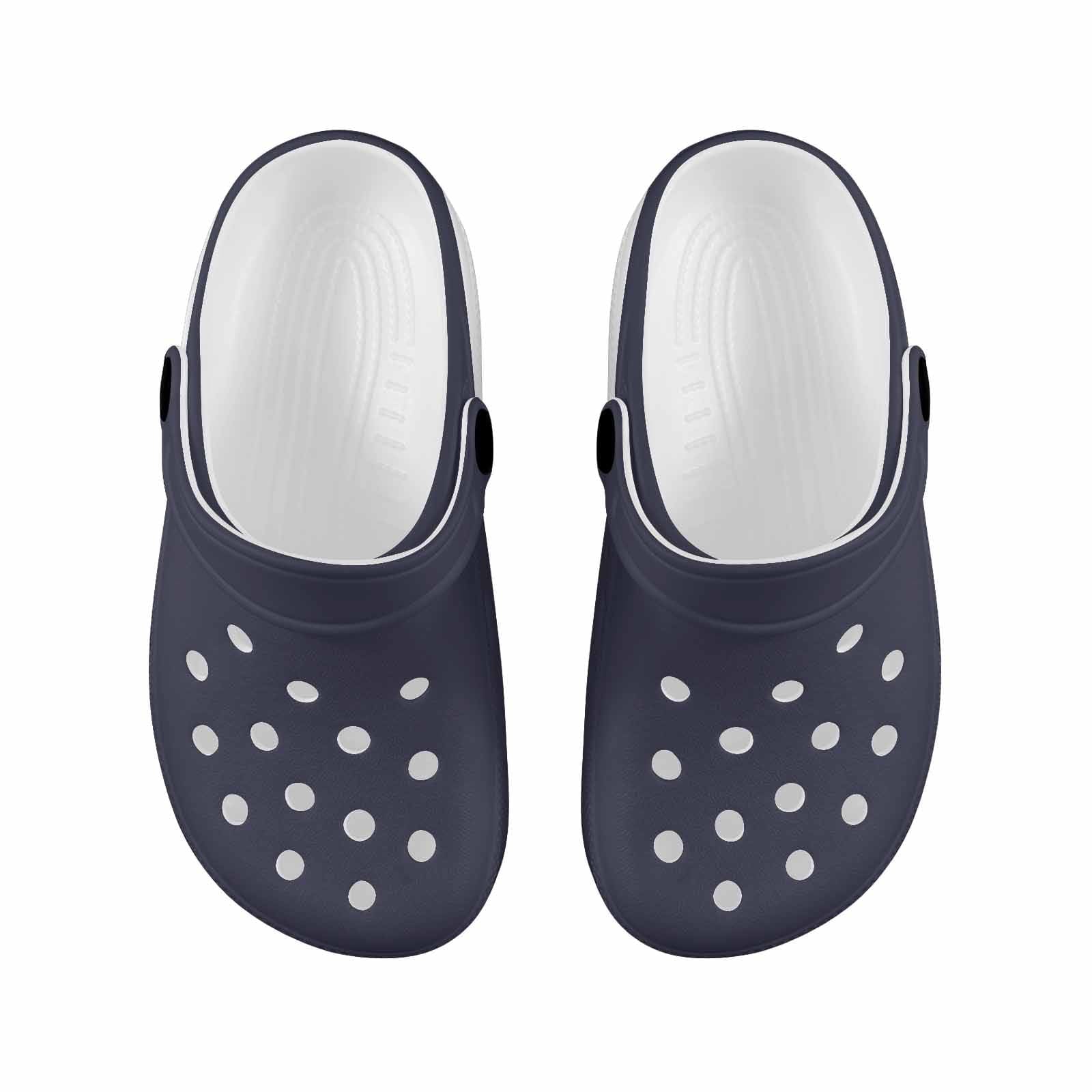 A pair of dark blue clogs designed for youth, featuring a slip-on design, ventilation ports, and cushioned soles for comfort.