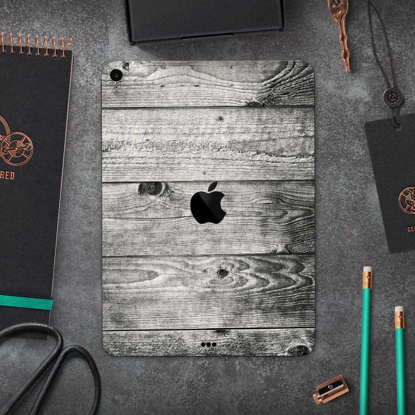 Dark Washed Wood Planks skin decal for Apple iPad Pro, showcasing a stylish wood texture design.