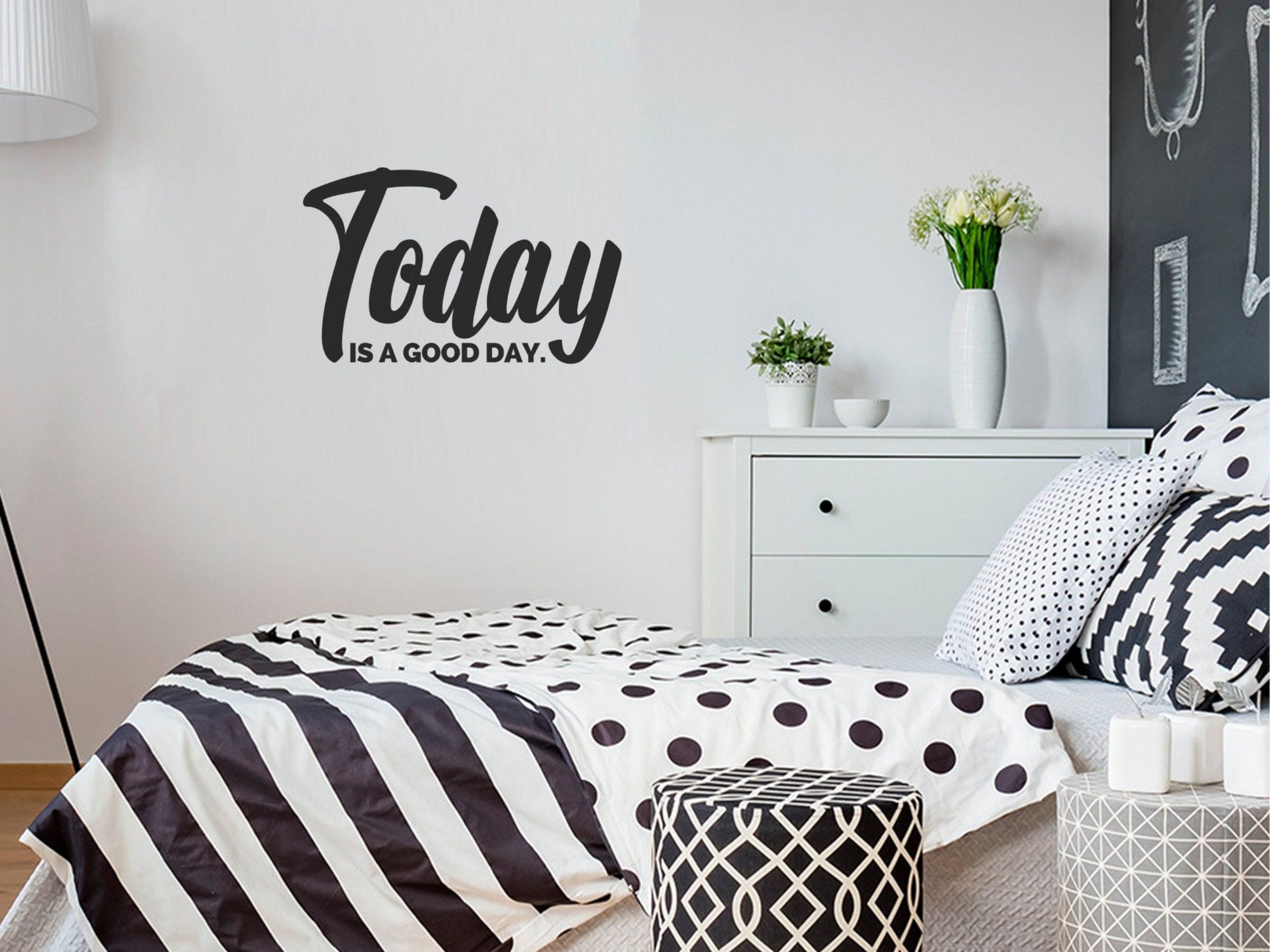 Today is a Good Day removable vinyl wall decal displayed on a smooth wall, showcasing its vibrant design and easy peel-and-stick feature.