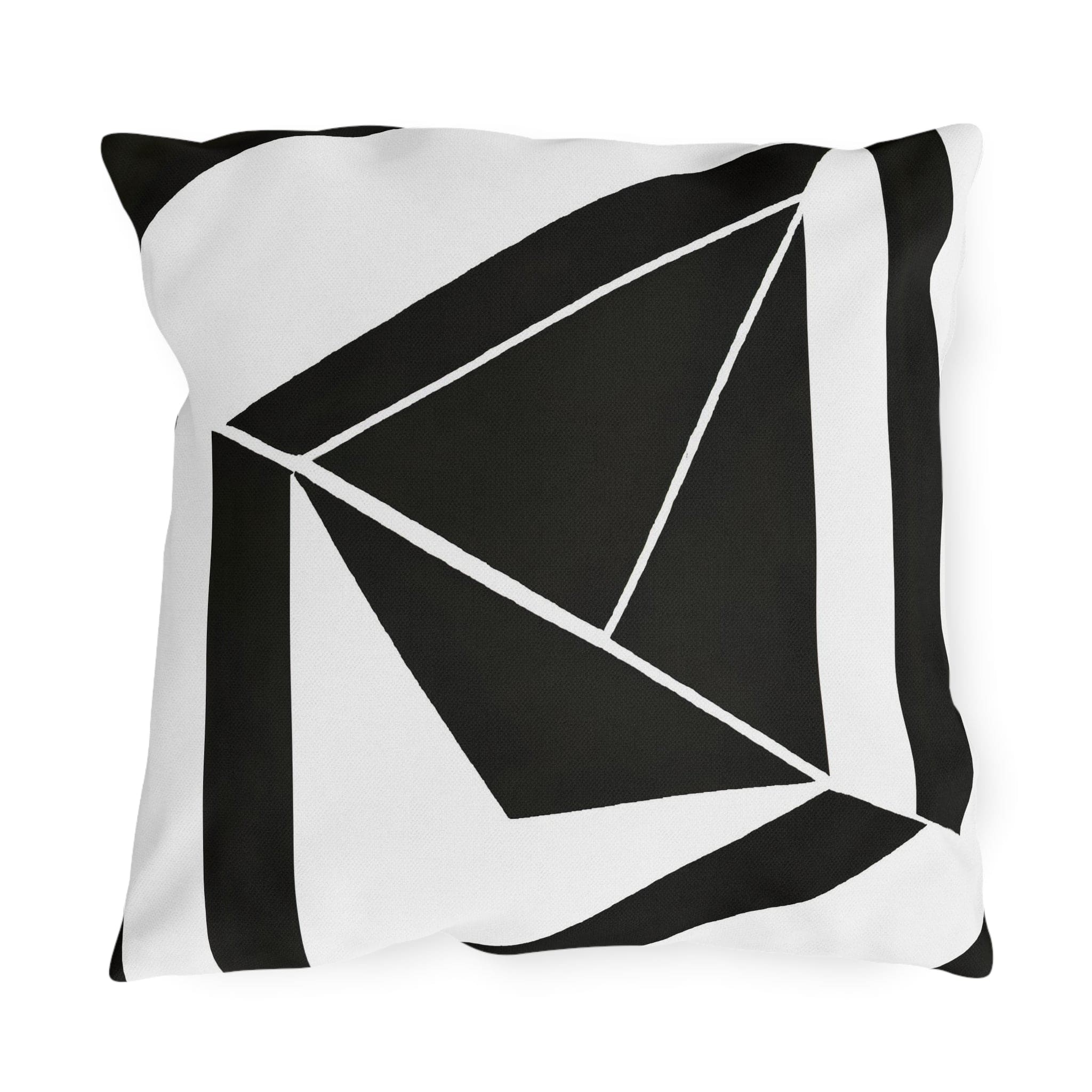Decorative indoor/outdoor pillow featuring a black and white geometric pattern, ideal for enhancing outdoor spaces.
