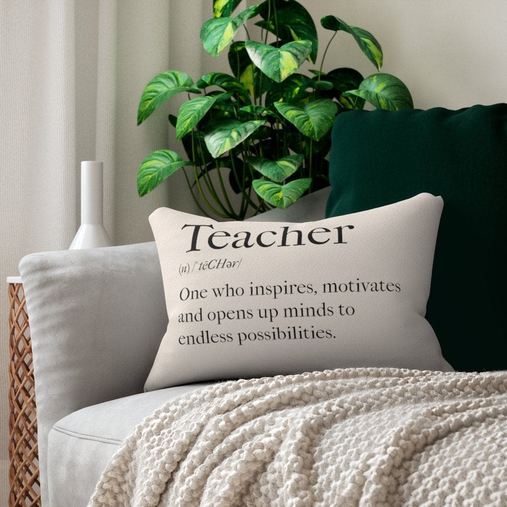 Decorative lumbar throw pillow in black and beige with inspiring words 'Teachers Inspire', showcasing a stylish and artistic design.