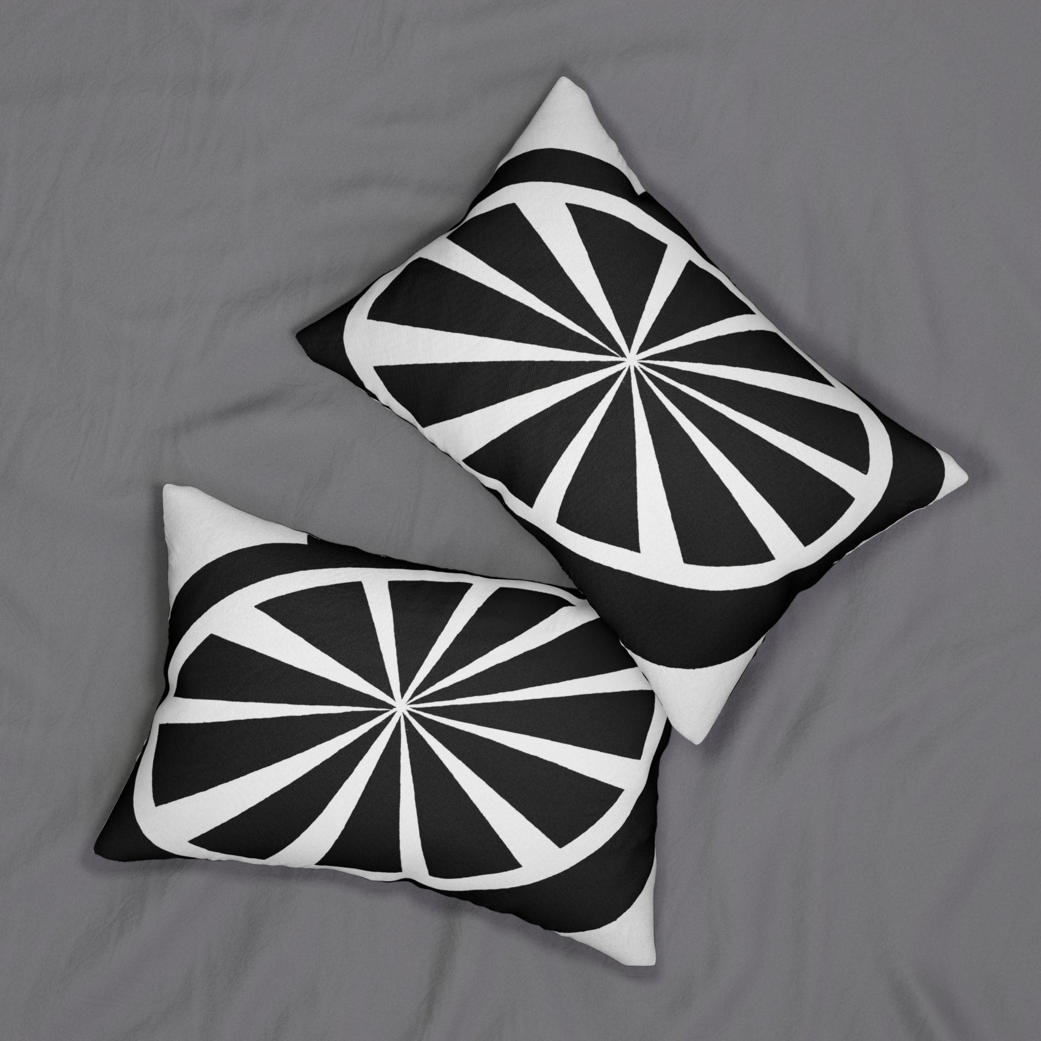 Decorative lumbar throw pillow featuring a black and white geometric pattern, showcasing its stylish design and plush texture.