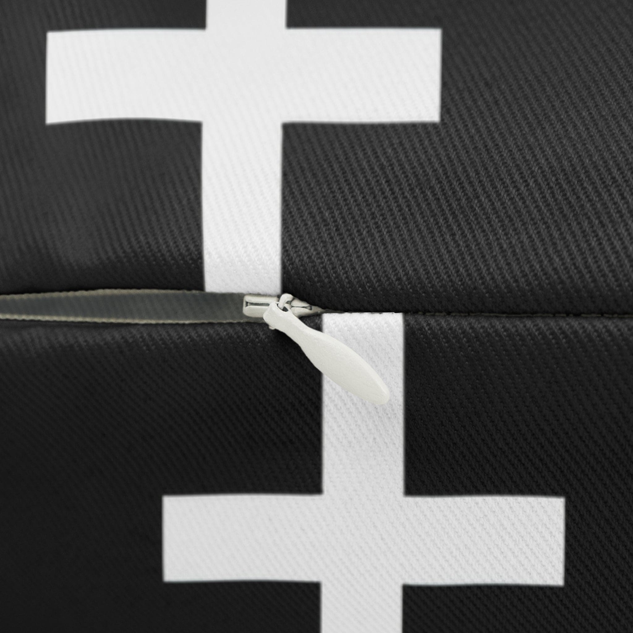 Decorative lumbar throw pillow featuring a black and white seamless cross design, showcasing artistic flair and comfort.
