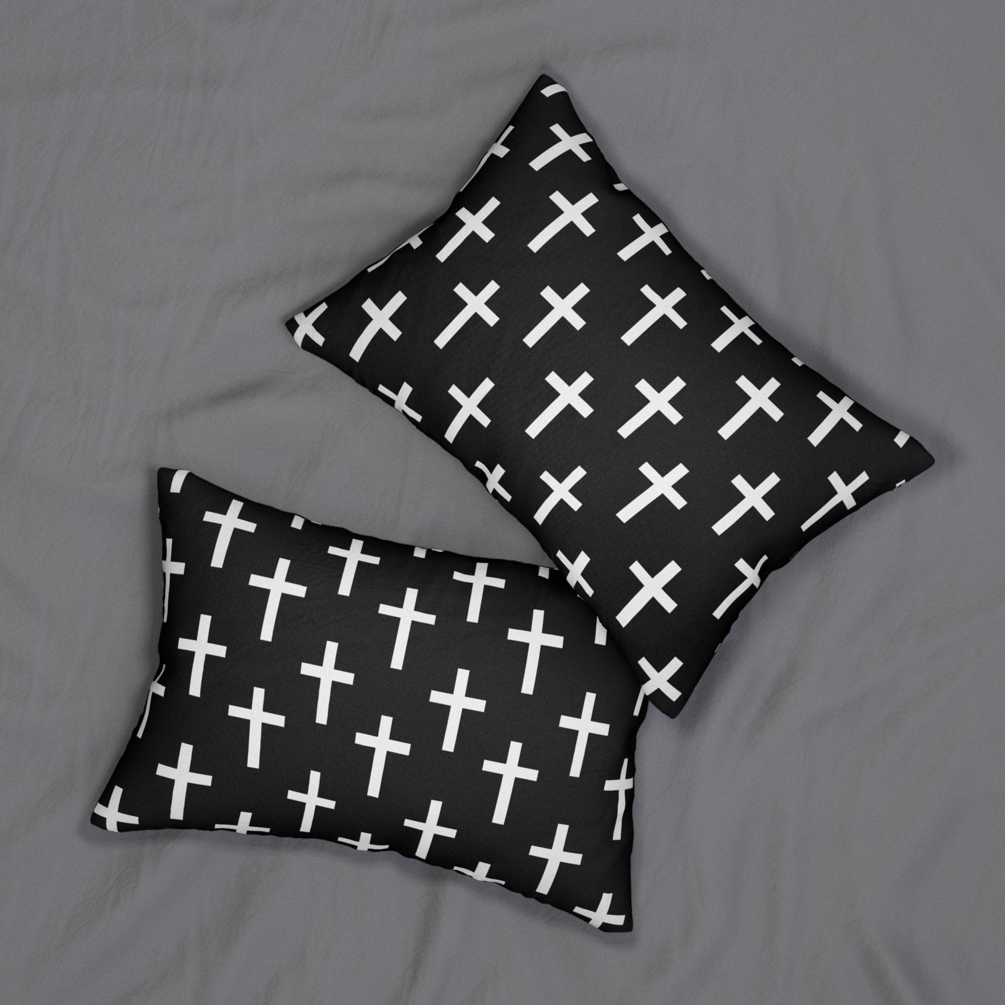 Decorative lumbar throw pillow featuring a black and white seamless cross design, showcasing artistic flair and comfort.