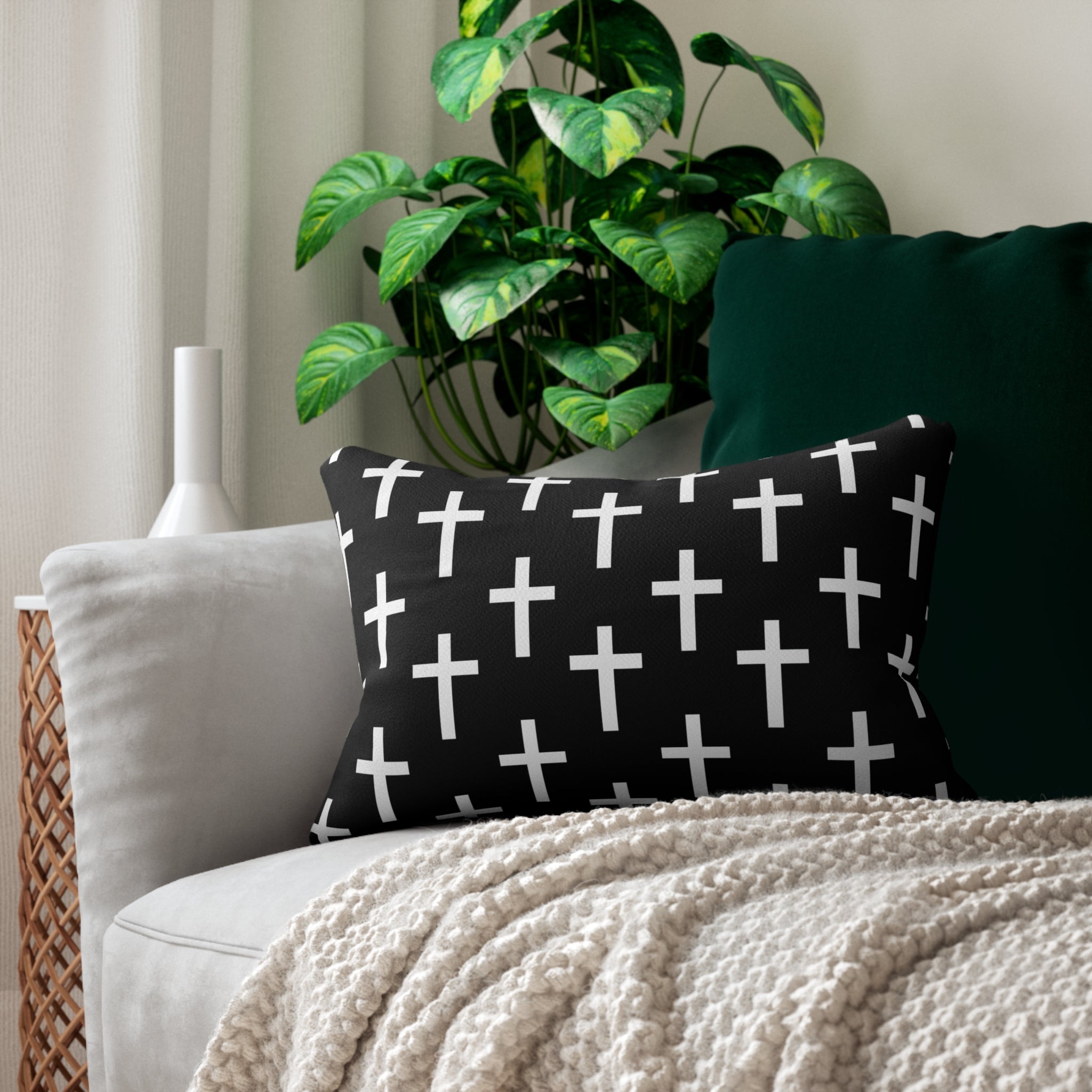 Decorative lumbar throw pillow featuring a black and white seamless cross design, showcasing artistic flair and comfort.
