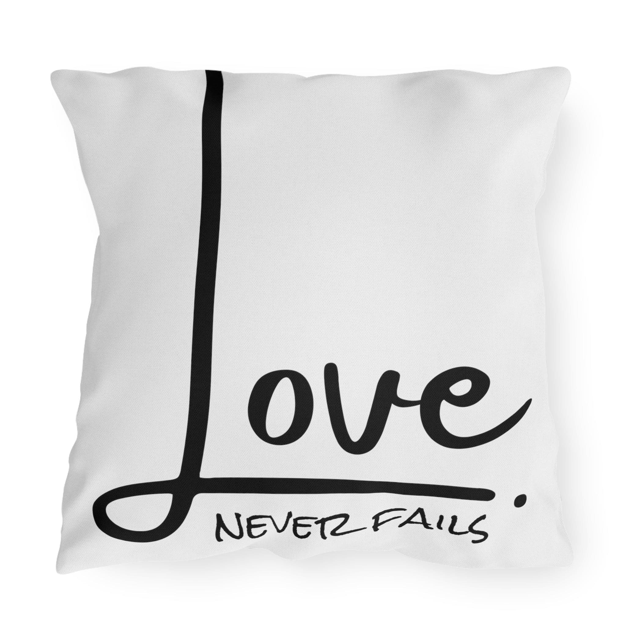 Decorative throw pillow cover featuring 'Love Never Fails' design, made from high-quality polyester with a concealed zipper.