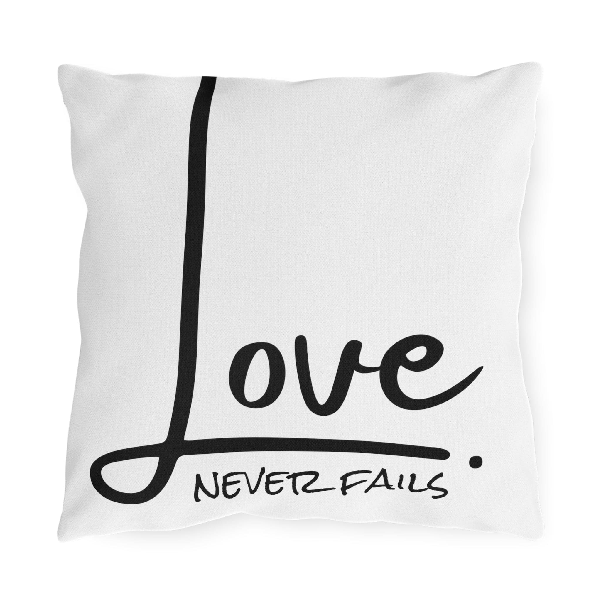 Decorative throw pillow cover featuring 'Love Never Fails' design, made from high-quality polyester with a concealed zipper.
