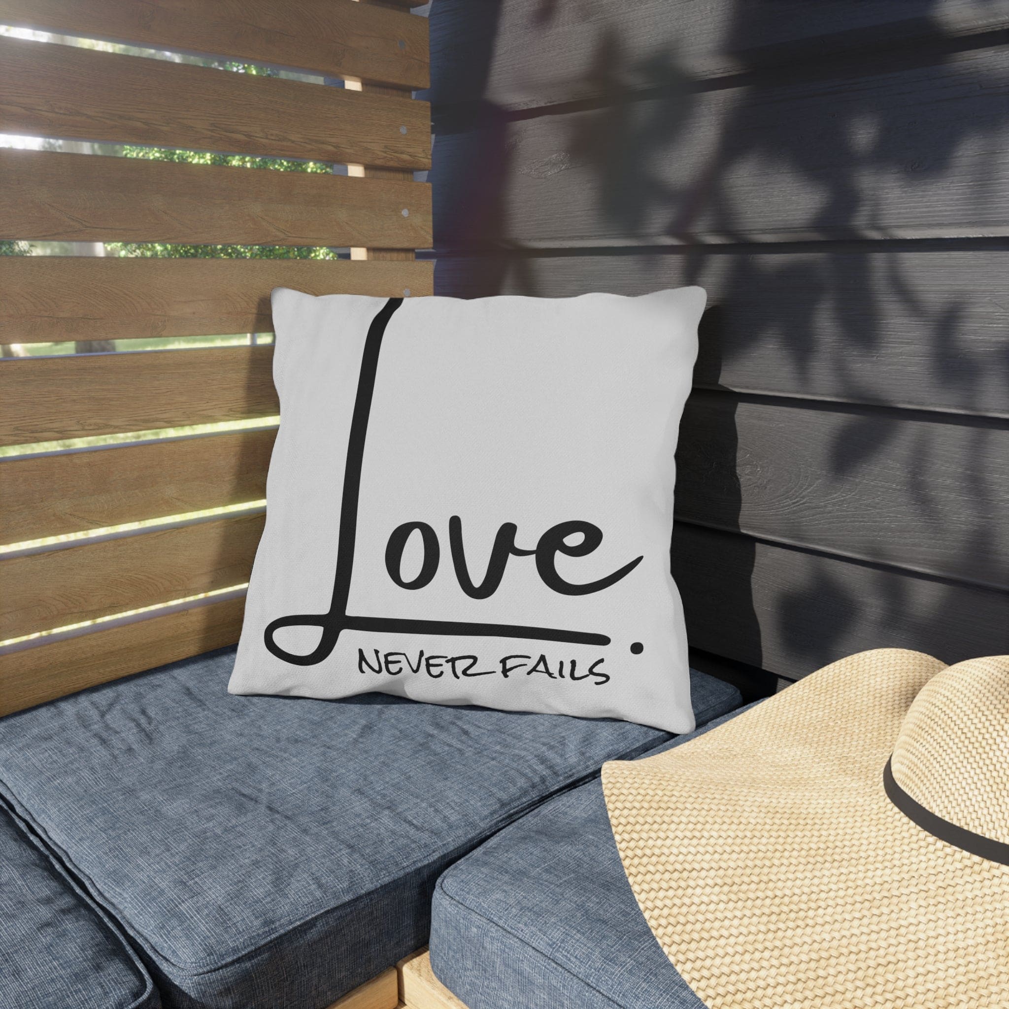 Decorative throw pillow cover featuring 'Love Never Fails' design, made from high-quality polyester with a concealed zipper.