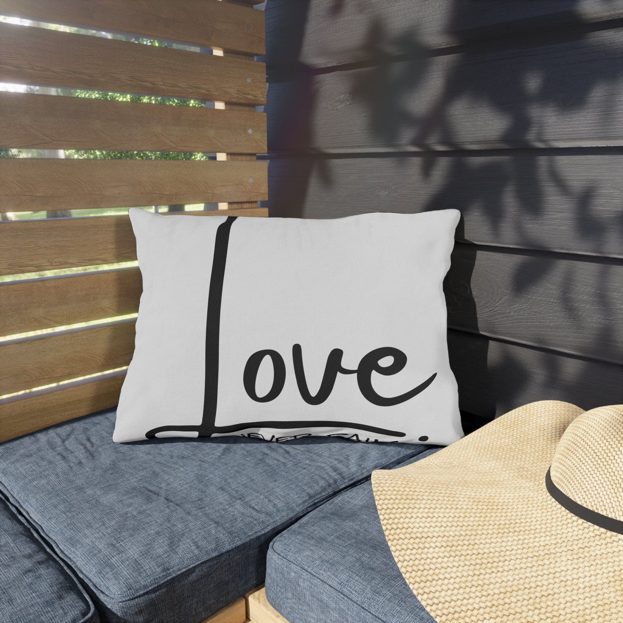 Decorative throw pillow cover featuring 'Love Never Fails' design, made from high-quality polyester with a concealed zipper.