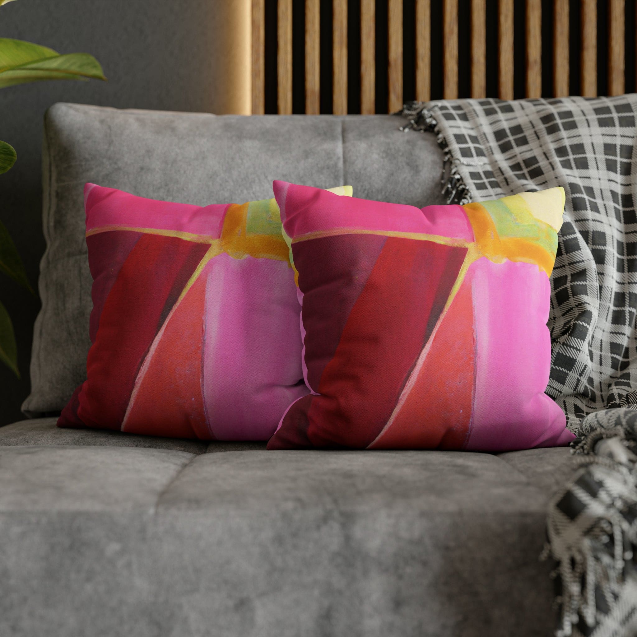 Decorative throw pillow cover in pink mauve red geometric pattern, featuring a concealed zipper and double-sided print.