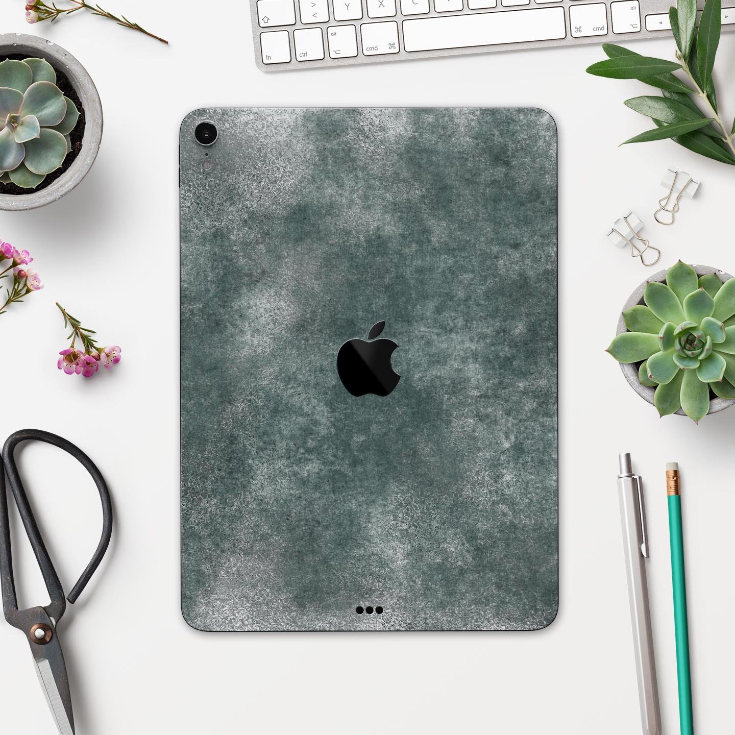 Distressed Silver Texture v12 skin decal for Apple devices, showcasing a sleek design and premium finish.