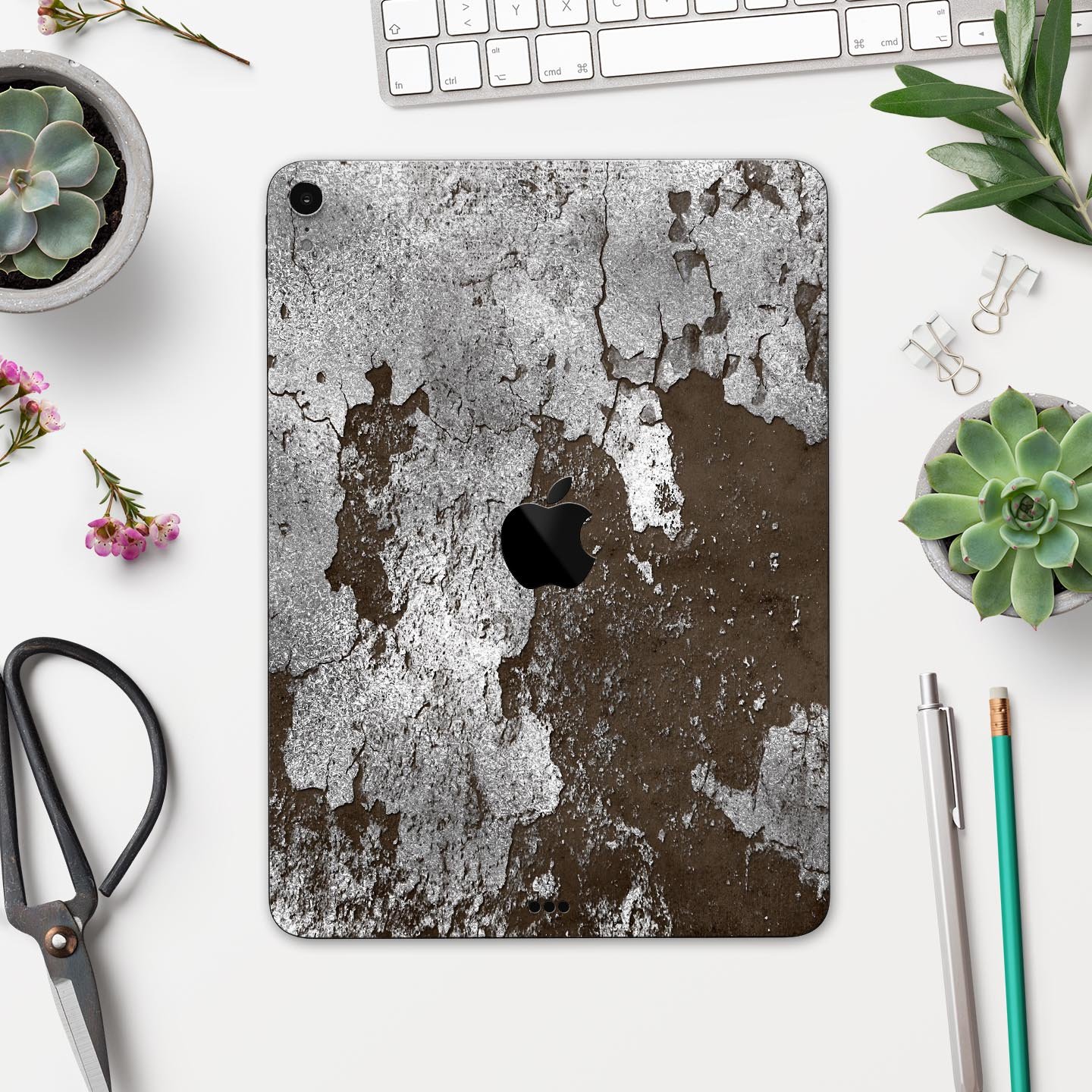 Distressed Silver Texture v16 skin decal for Apple devices, showcasing a sleek design and premium finish.
