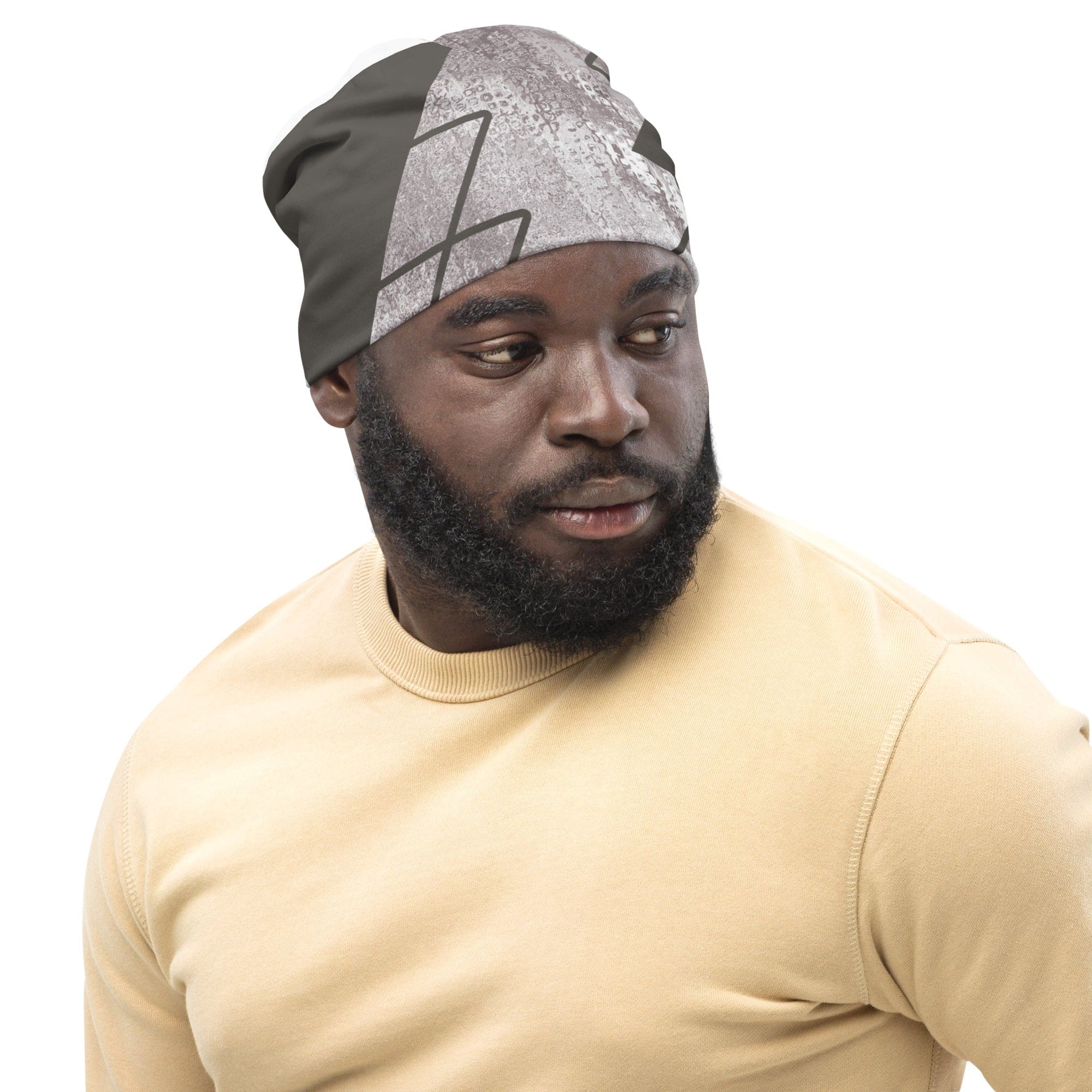 Double-layered beanie hat in ash grey and white triangular colorblock design, showcasing its soft fabric and stylish look.