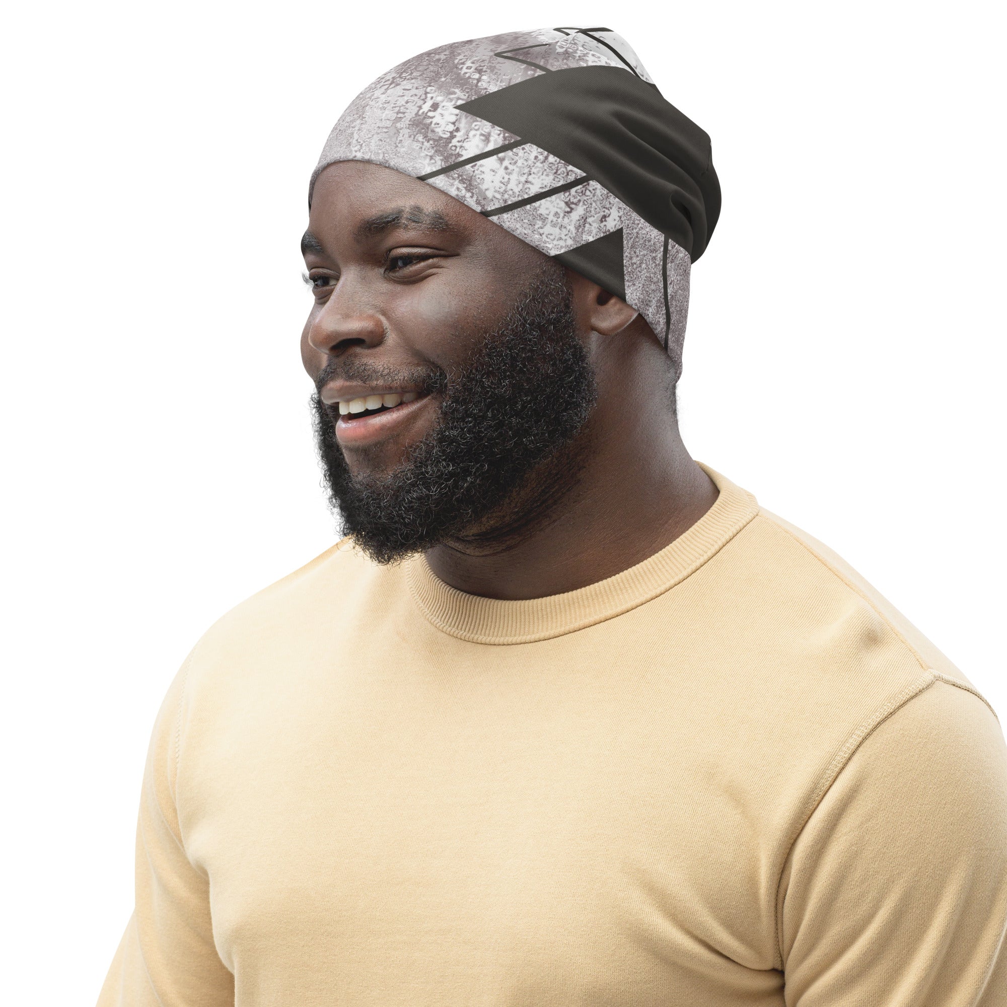 Double-layered beanie hat in ash grey and white triangular colorblock design, showcasing its soft fabric and stylish look.