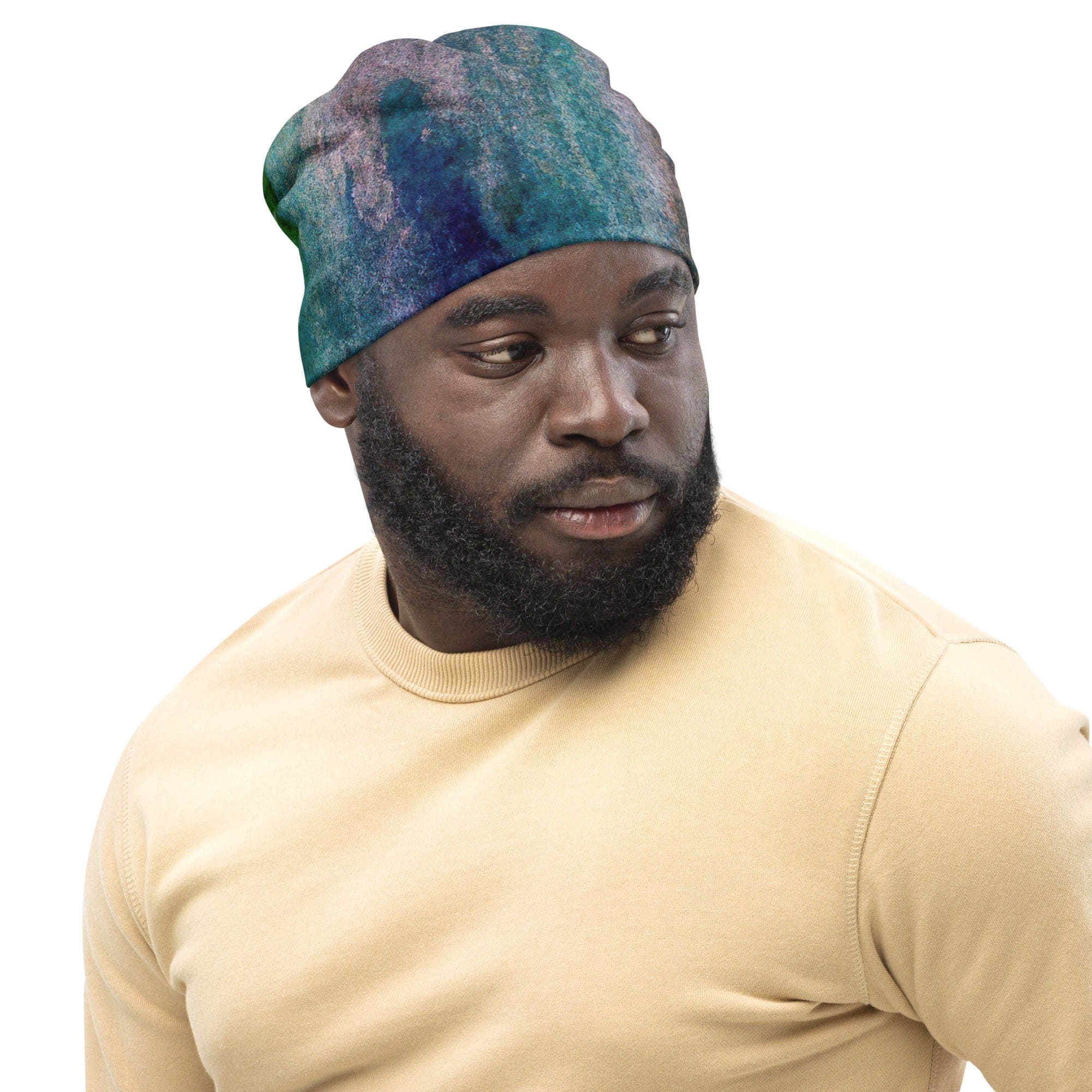 Double-layered beanie hat in blue hue watercolor abstract print, showcasing vibrant colors and a stylish design.