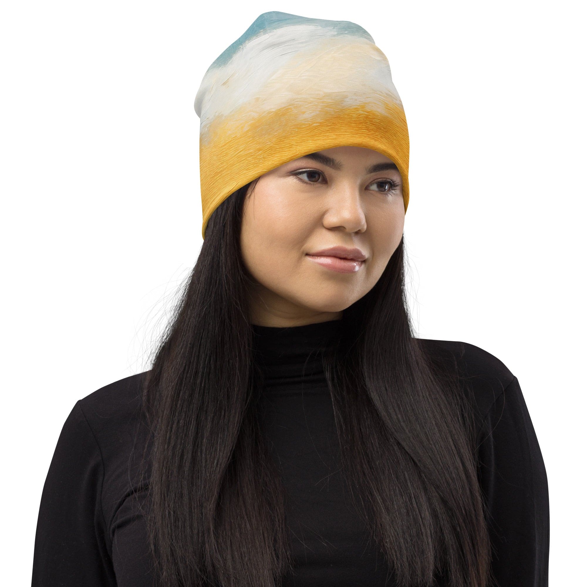 Double-layered beanie hat featuring a blue ocean and golden sunset print, perfect for stylish warmth in all seasons.