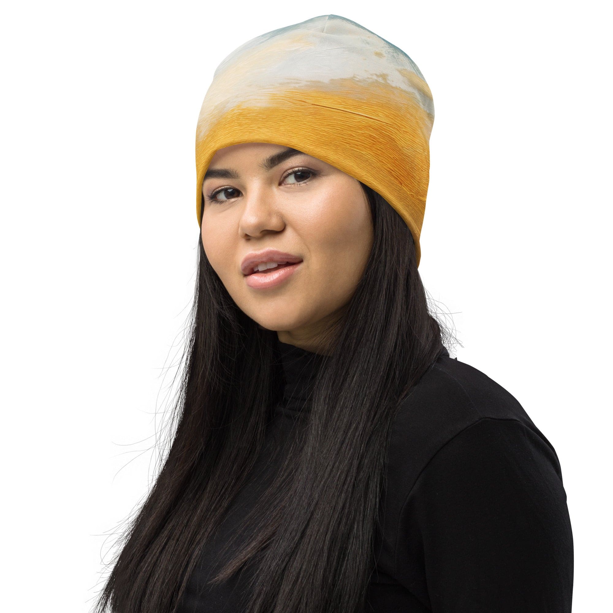Double-layered beanie hat featuring a blue ocean and golden sunset print, perfect for stylish warmth in all seasons.